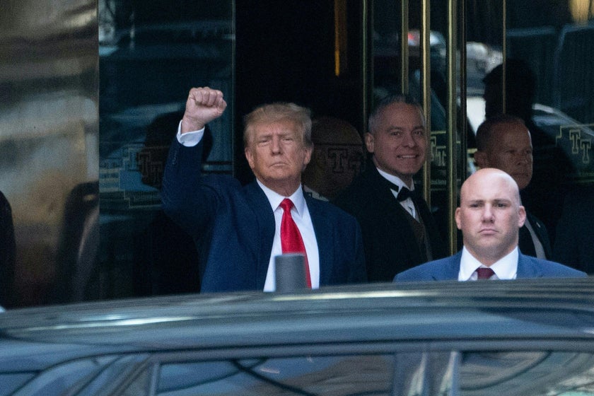 The Trump raised-fist photo from his arraignment was the defiant meme ...