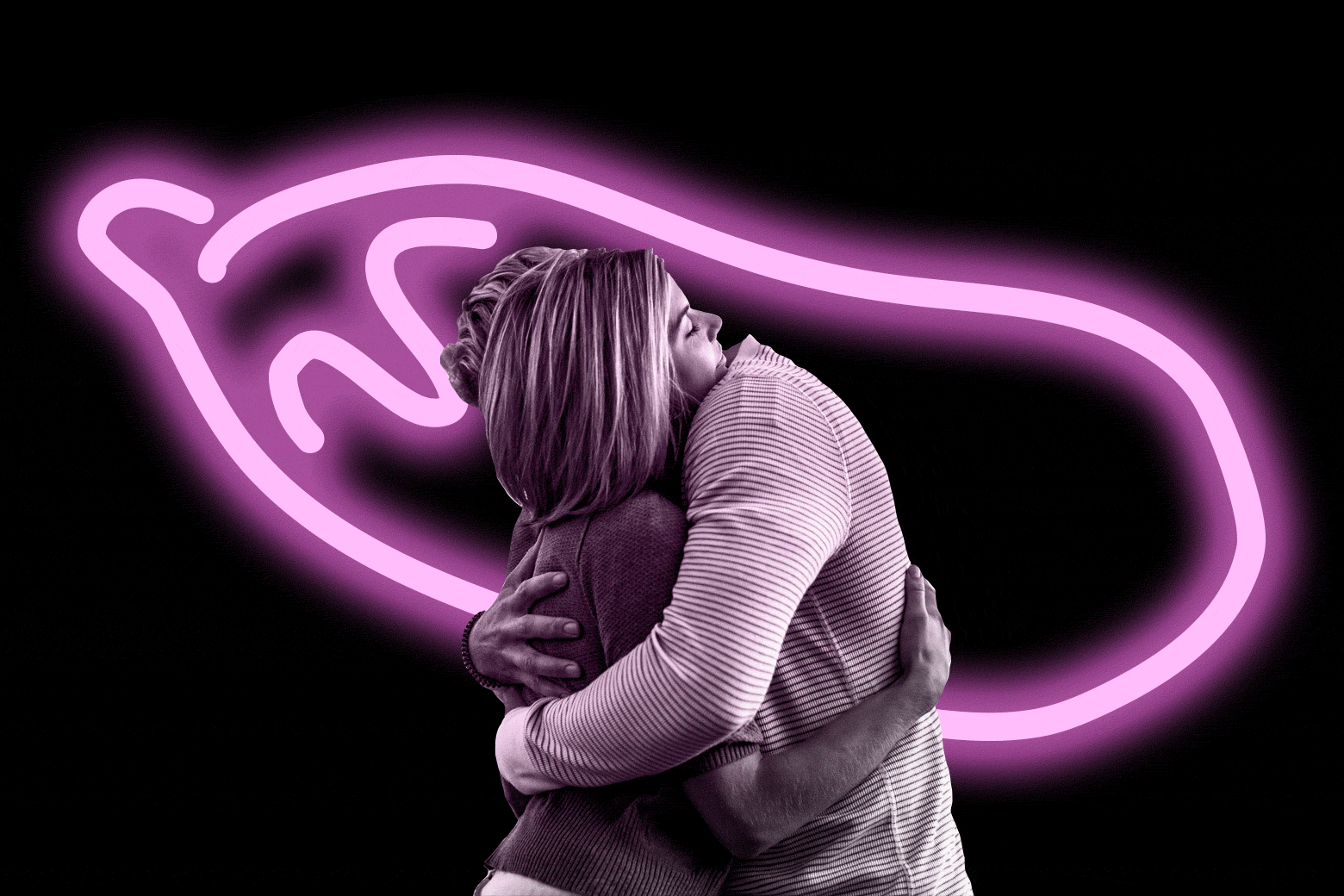 A man hugging a woman.