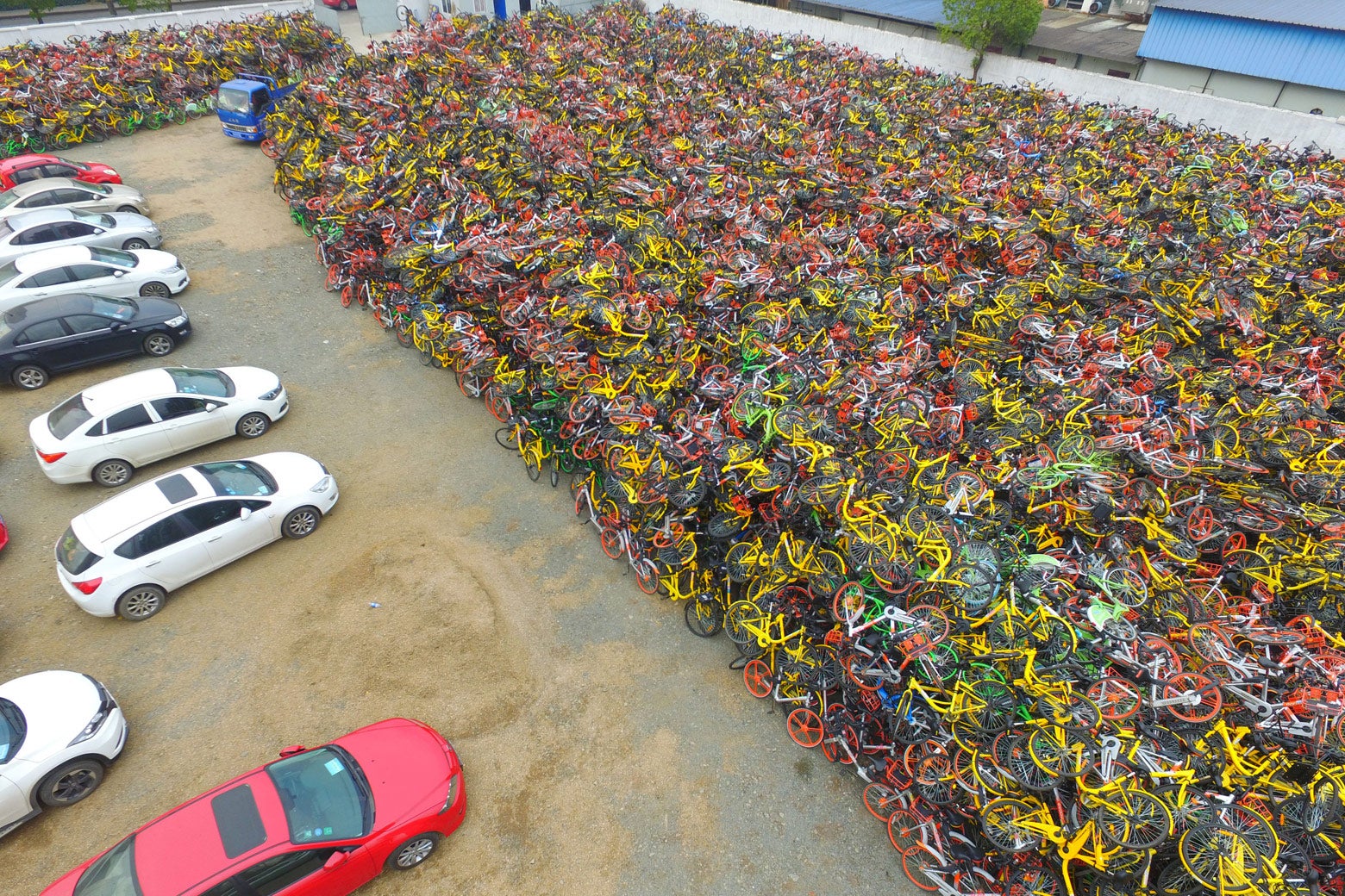 Tens of thousands of abandoned shared bikes pile up at a parking lot in the Jiangning District of Nanjing, China, on Nov. 28.