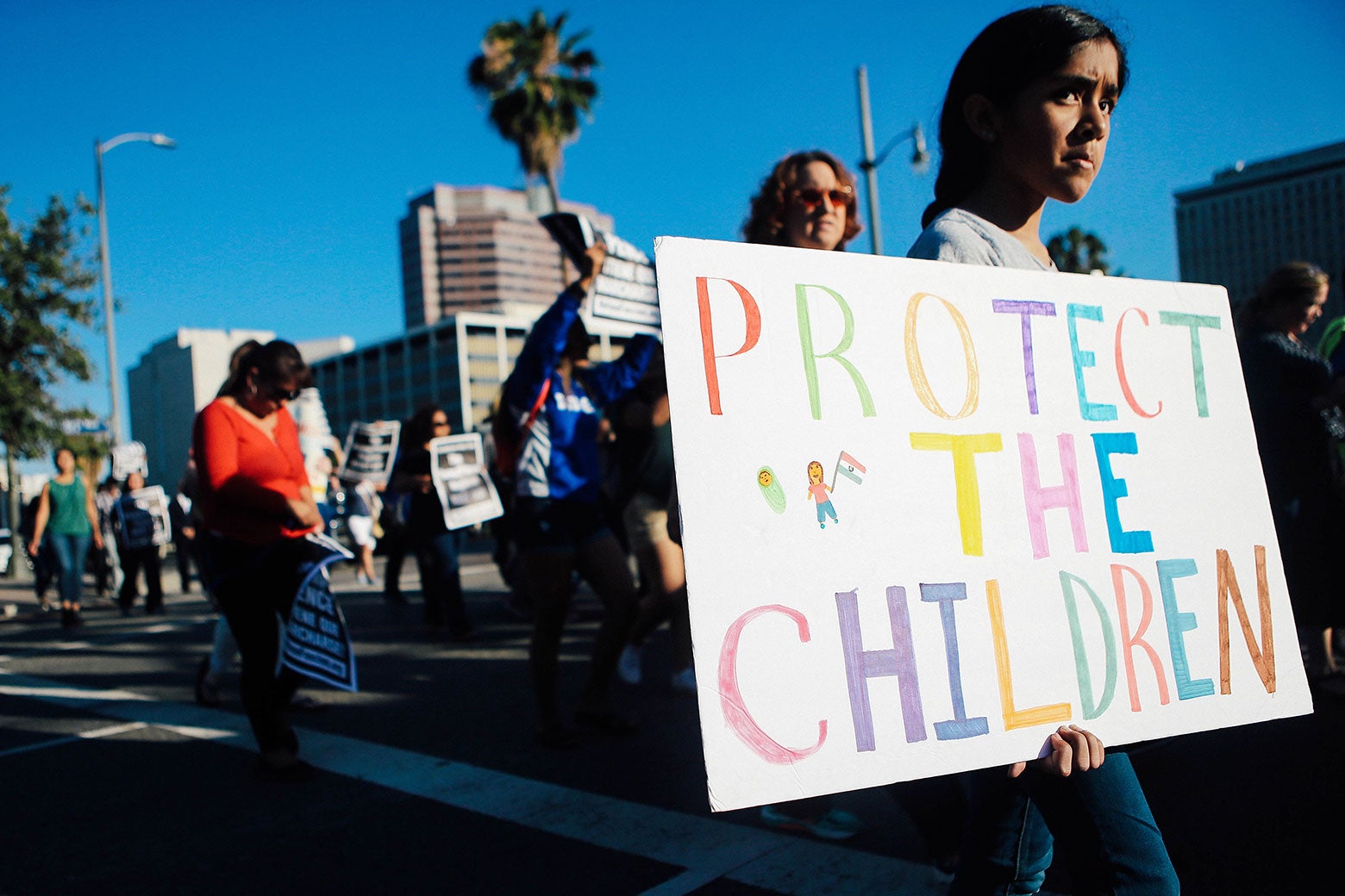 Protestors march against the separation of migrant children from their families in Los Angeles.