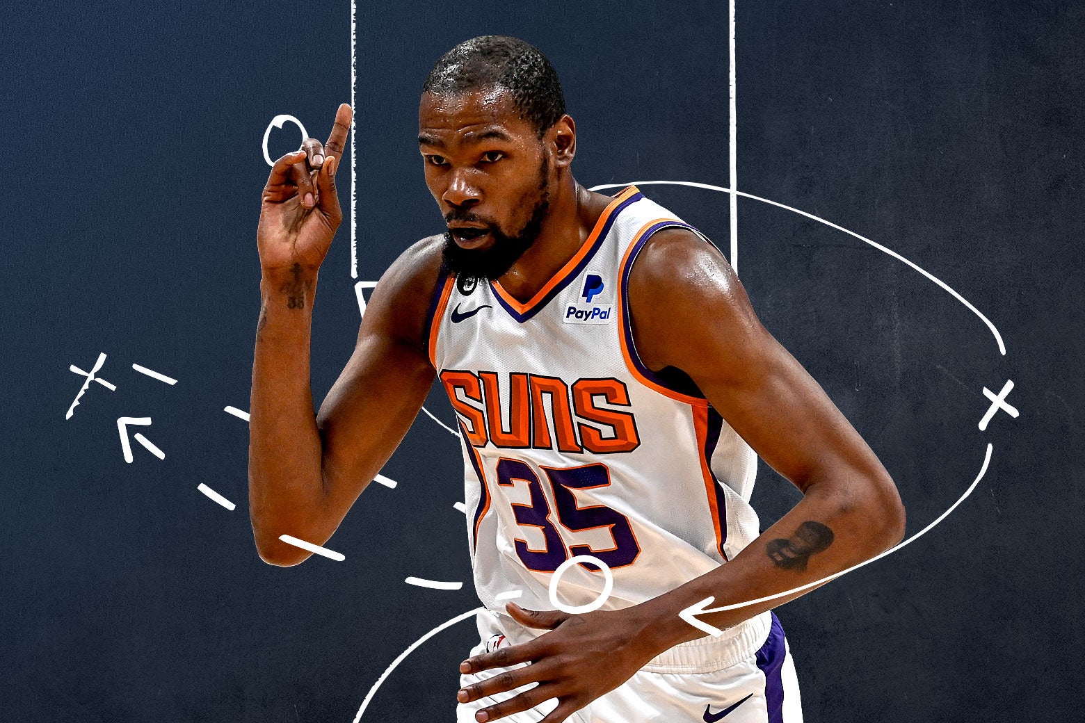 KD in his Suns uniform with his right pointer finger in the air, his left arm down in front of him, with the X's and O's of a play illustrated around him.