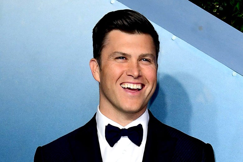 Jost smiling in a tux on a red carpet