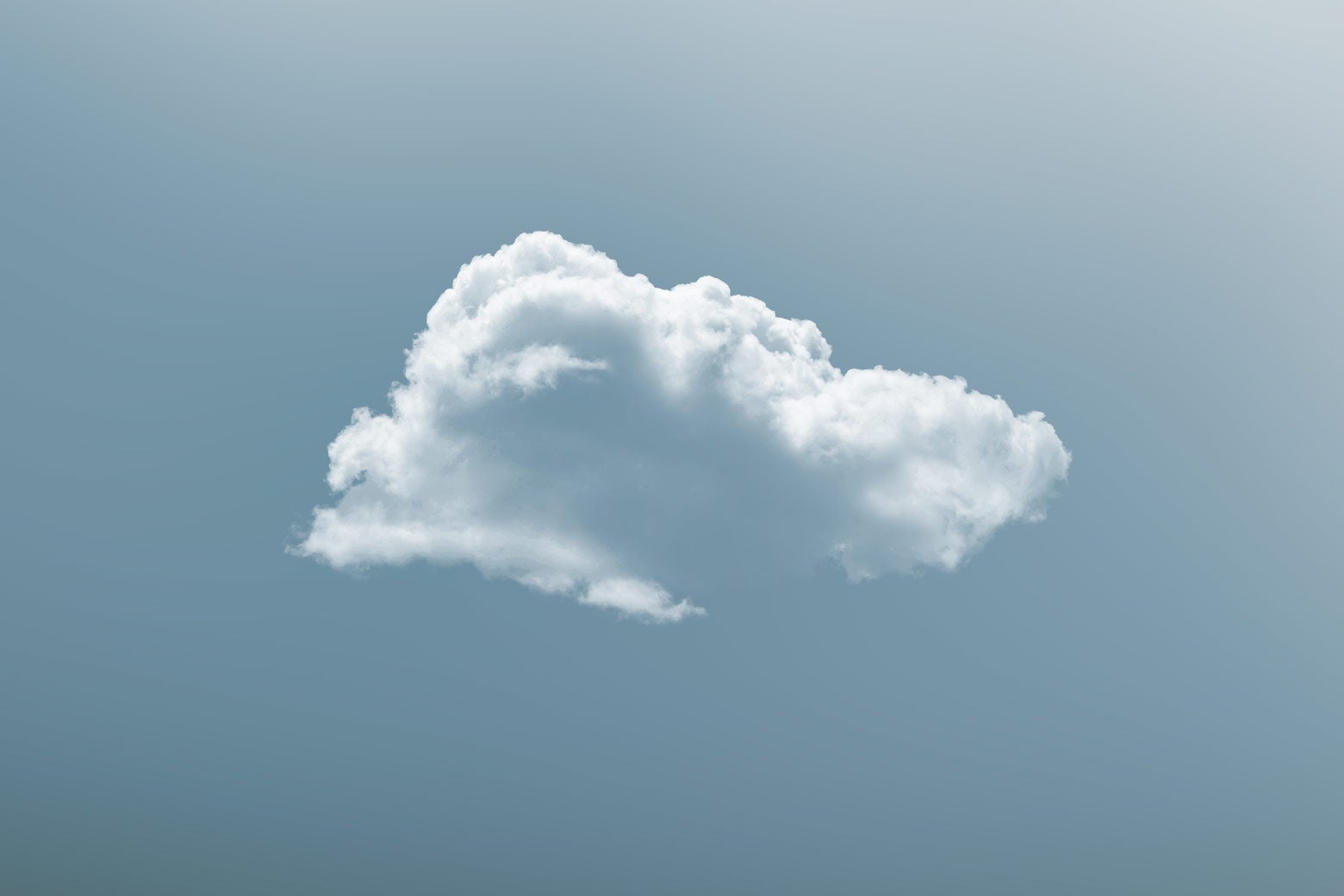 A single white cloud in a blue-grey sky. 