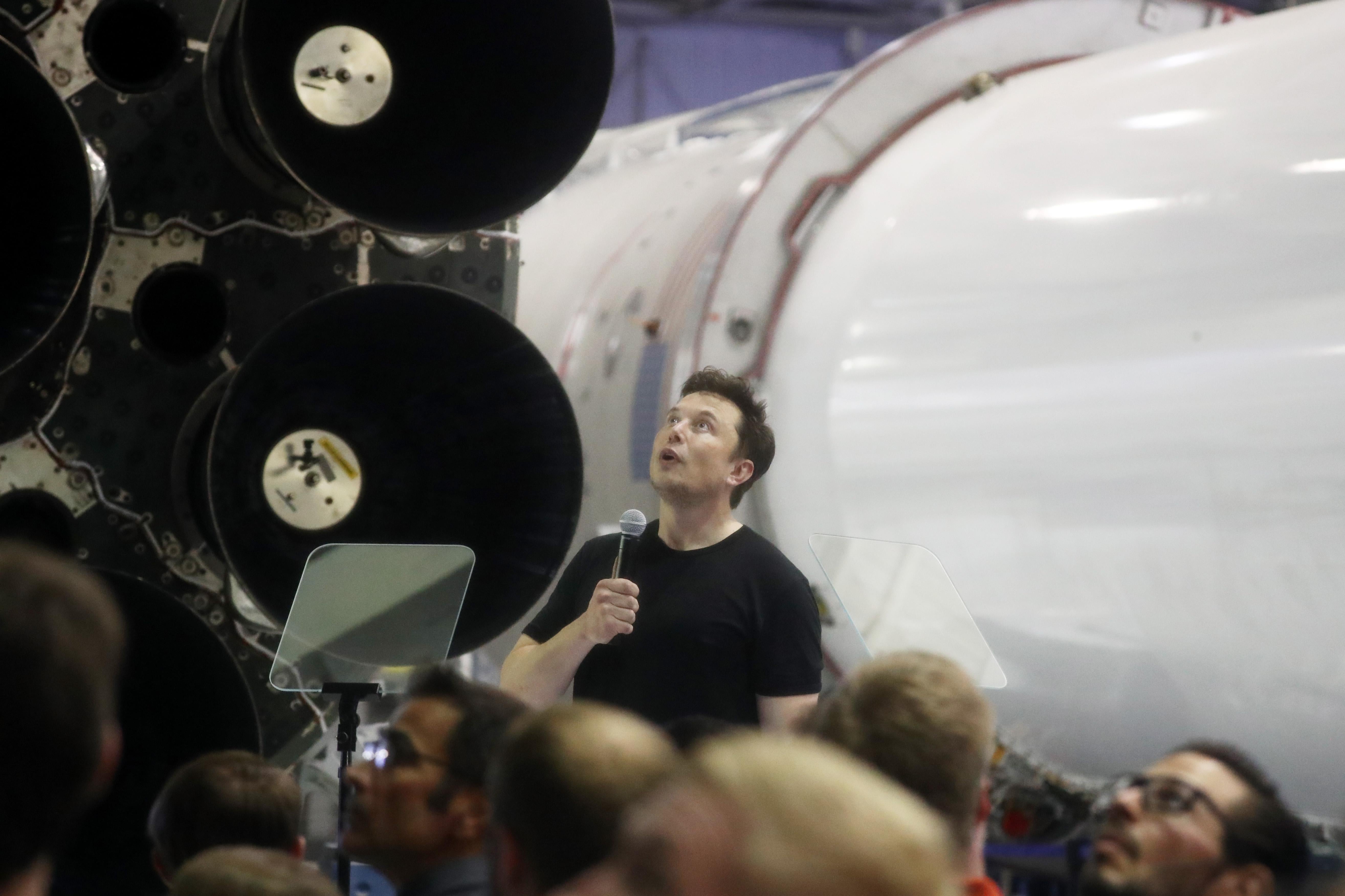 Elon Musk speaking at the headquarters of SpaceX, his rocket company