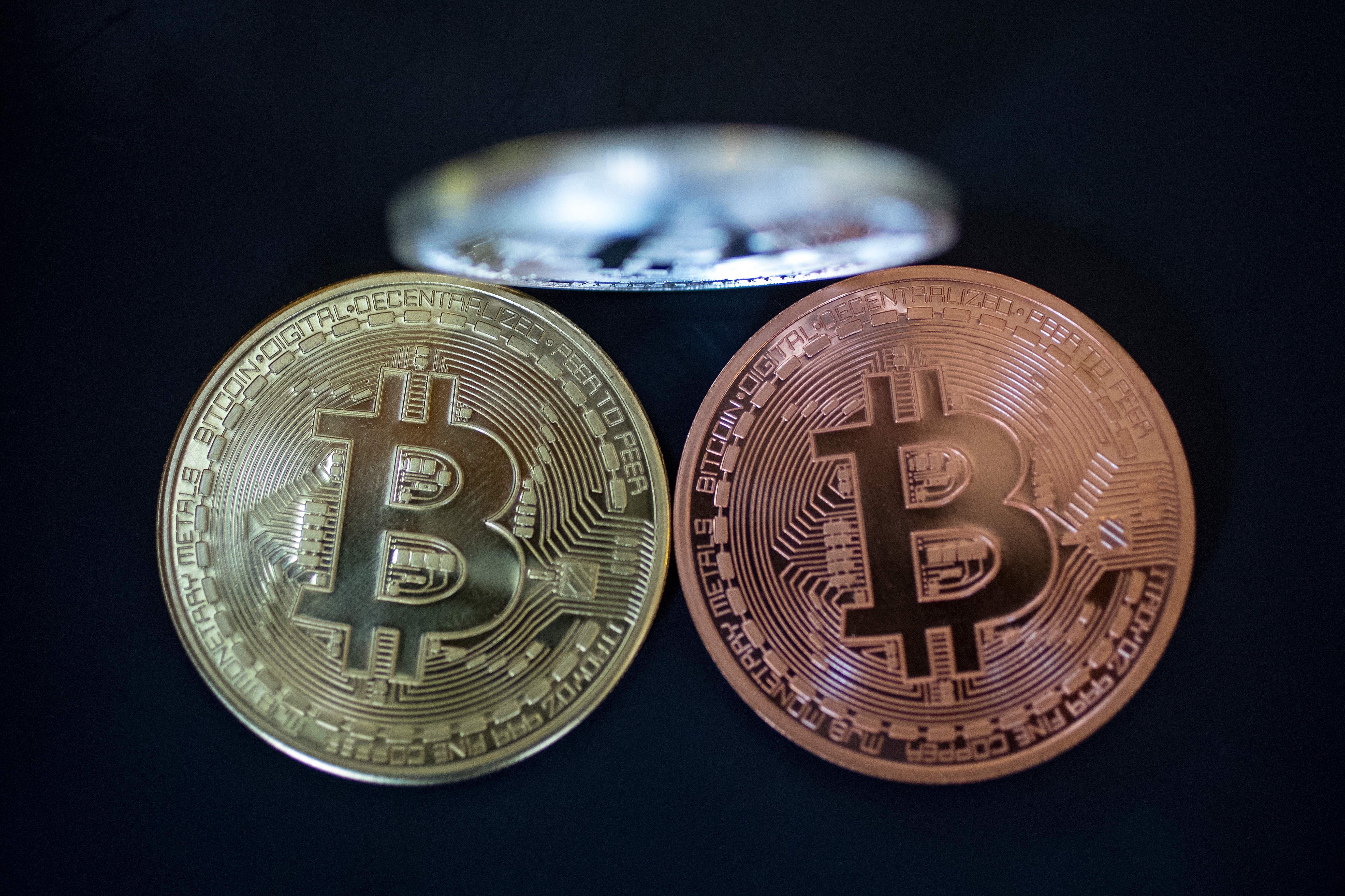 Google bans cryptocurrency ads, sending price of bitcoin down