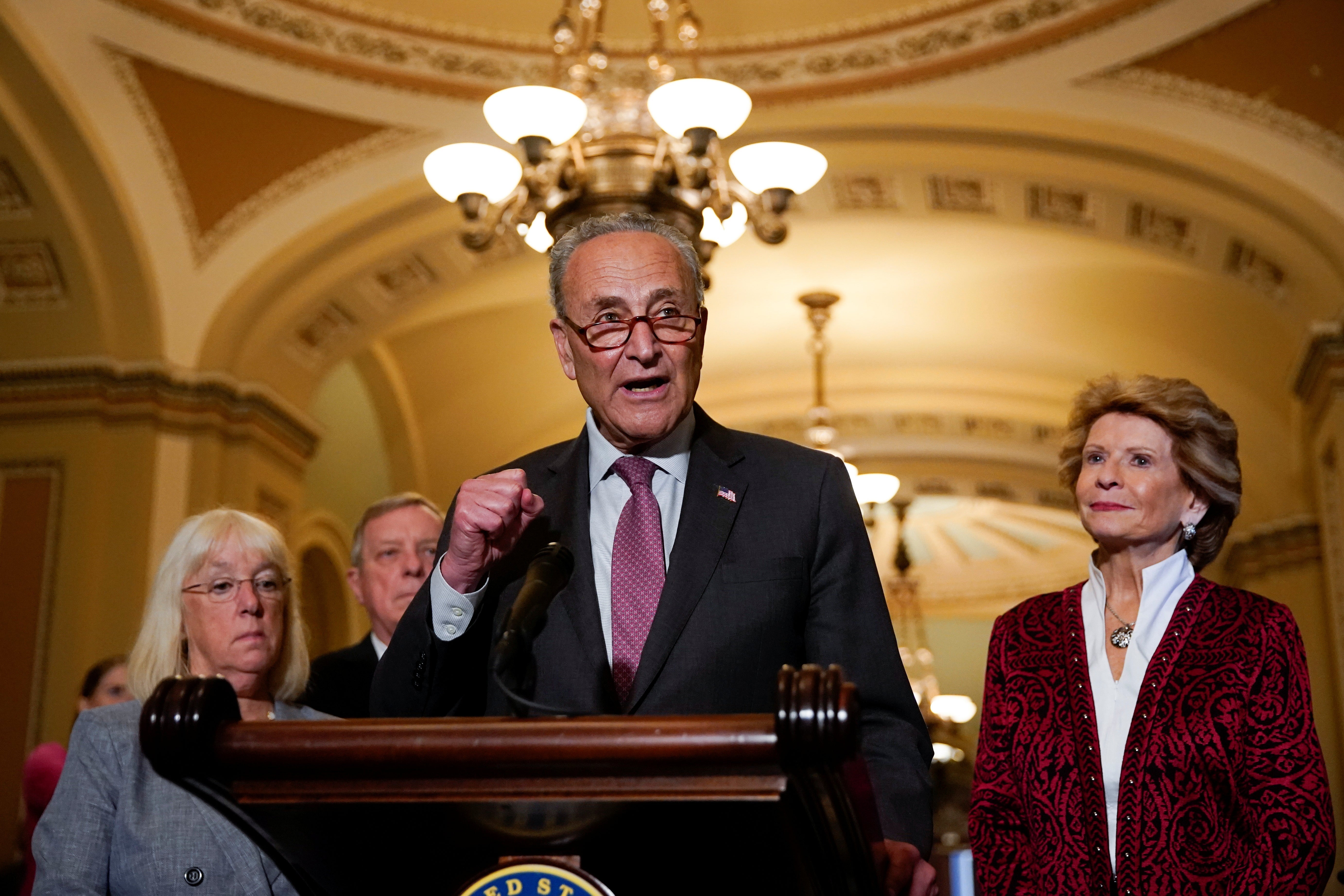 Schumer is flanked by Murray, Durbin, and Stabenow as he talks to reporters at the U.S. Capitol.