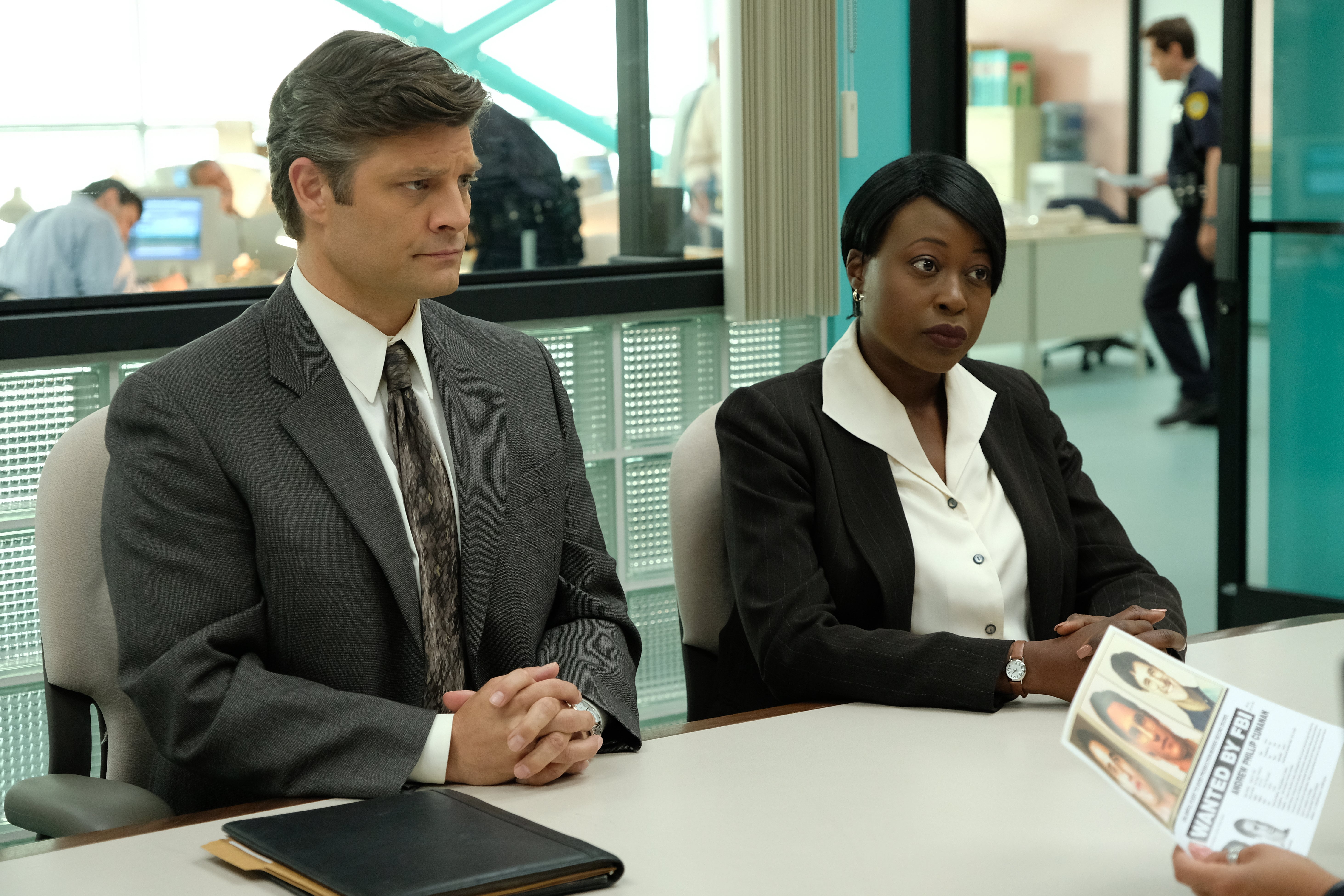 Jay R. Ferguson as FBI Agent Evans and Christine Horn as FBI Agent Gruber.