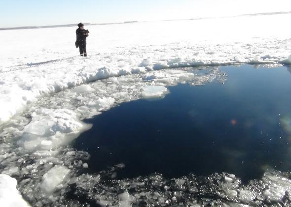 A hole in the Chebarkul Lake made by meteor fragments. A meteor shower hit Russia's Chelyabinsk region on February 15, 2013.
