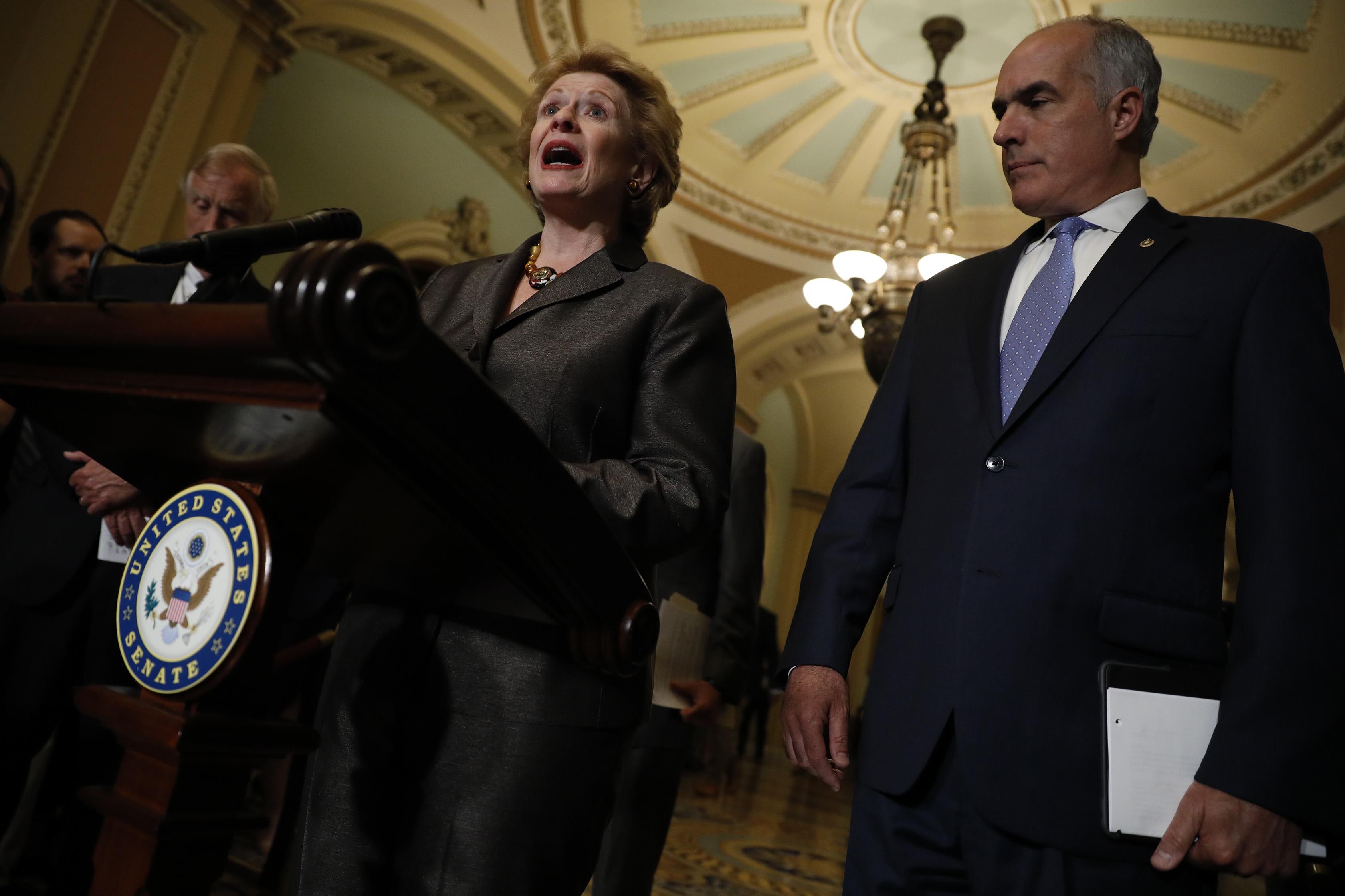 Sens. Debbie Stabenow and Bob Casey speak with reporters on Capitol Hill