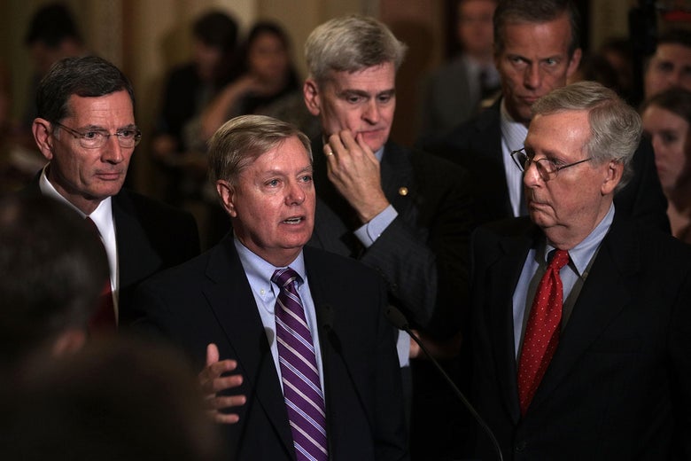 WASHINGTON, DC - SEPTEMBER 19: U.S. Sen. Lindsey Graham (R-SC) (2nd L) speaks as (L-R) Sen. John Barrasso (R-WY), Sen. Bill Cassidy (R-LA), Sen. John Thune (R-SD), and Senate Majority Leader Sen. Mitch McConnell (R-KY) listen during a news briefing after the weekly Senate Republican policy luncheon at the Capitol September 19, 2017 in Washington, DC. Senate Republican held a weekly policy luncheon to discuss GOP agenda. (Photo by Alex Wong/Getty Images)