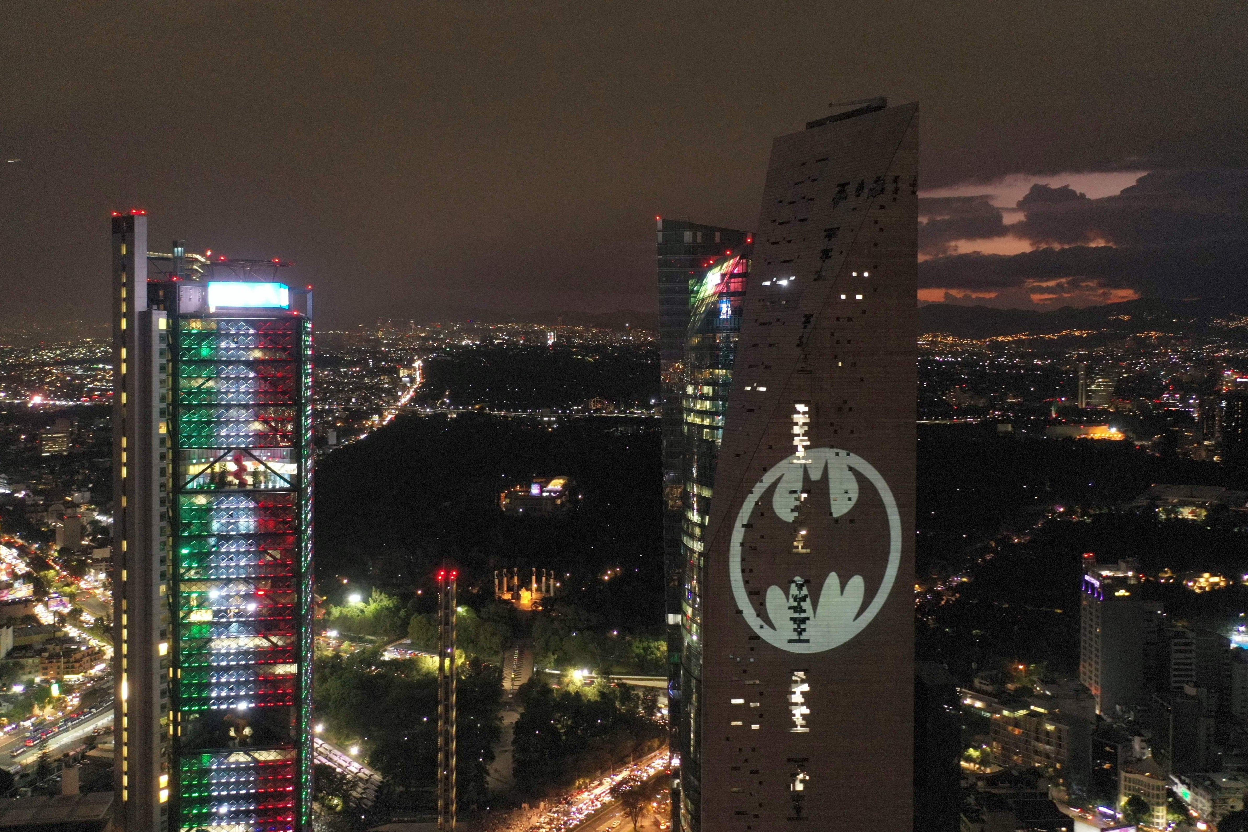 Batman Day: Cities from Melbourne to New York celebrated Batman's 80th by  sending up the Bat Signal. Batman ignored them.