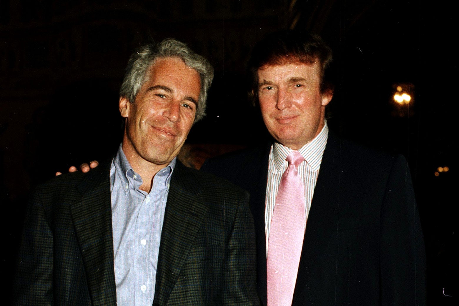 Jeffrey Epstein and Donald Trump at Mar-a-Lago on Feb. 22, 1997. Davidoff Studios/Getty Images