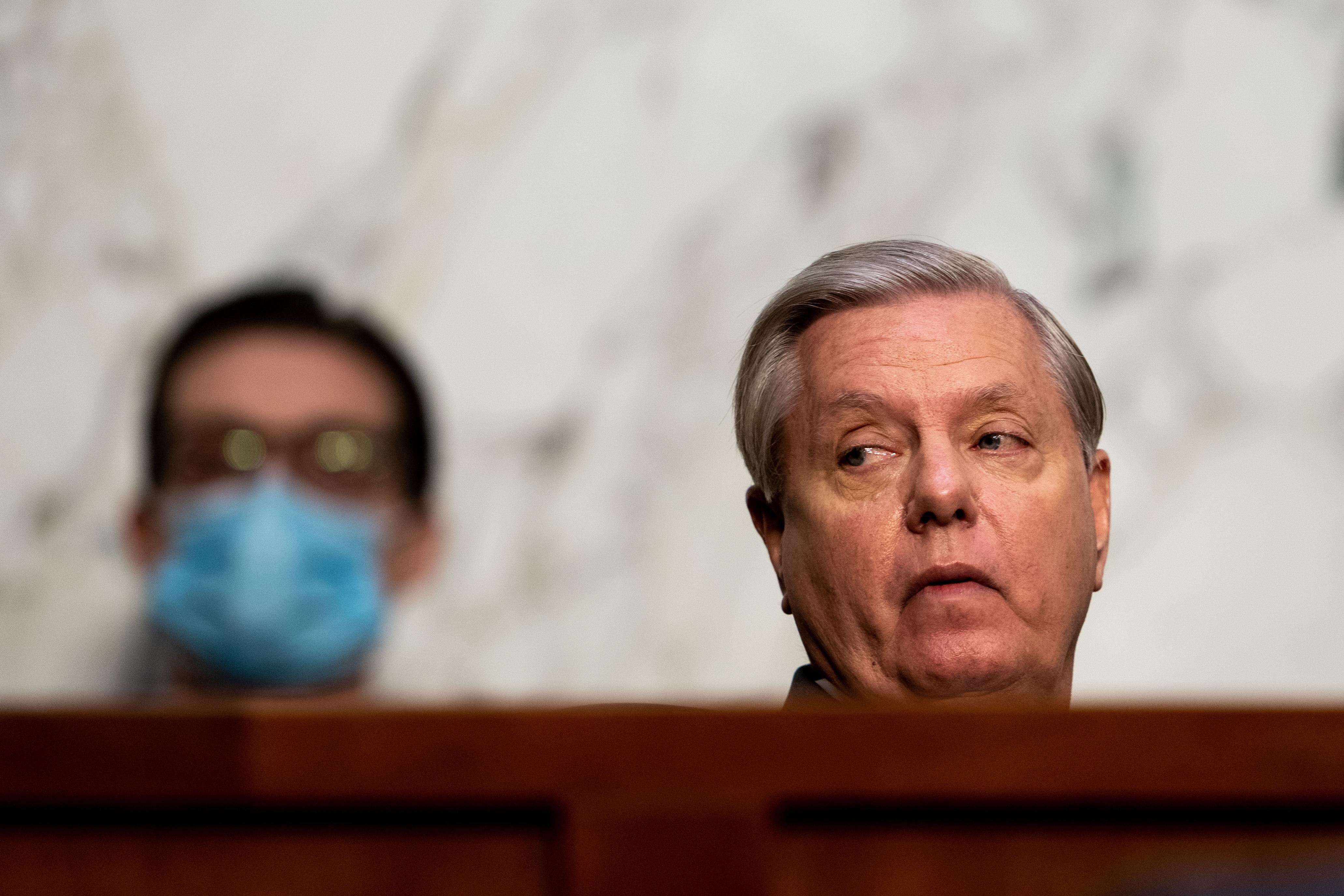 Committee chairman U.S. Sen. Lindsey Graham listens during Supreme Court Justice nominee Judge Amy Coney Barrett's Senate Judiciary Committee confirmation hearing for Supreme Court Justice in the Hart Senate Office Building on October 12, 2020 in Washington, DC.