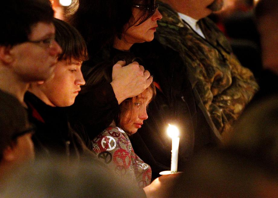 The people of West, Texas, during a candlelight vigil on Thursday, April 18, 2013, for victims, families, friends and first responders near the scene of the fertilizer plant that exploded Wednesday night.