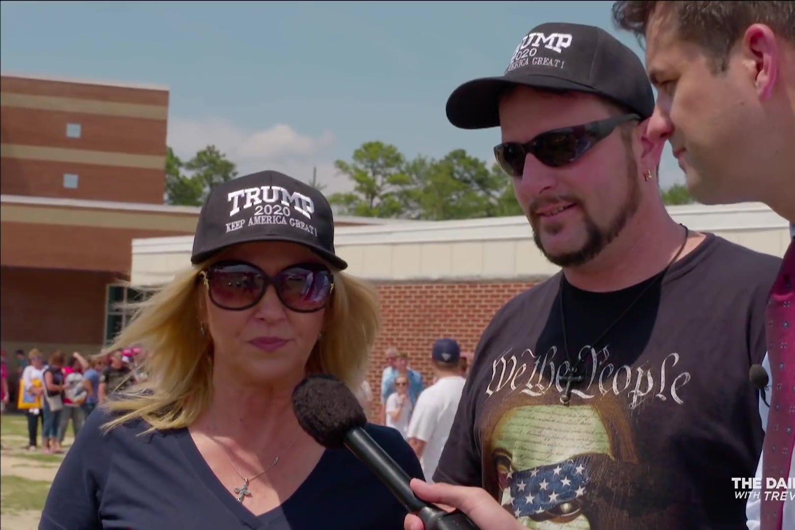 Michael Kosta interviewing two Trump supporters.