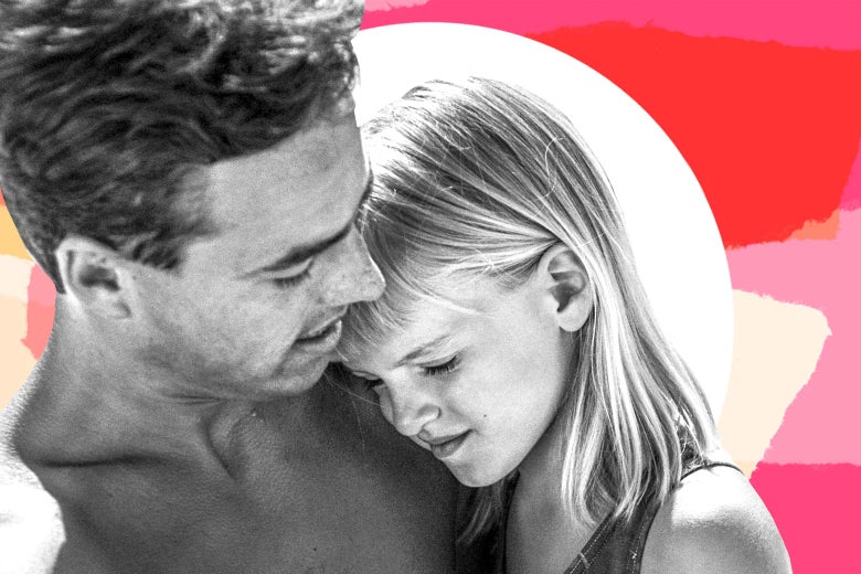 A man hugs a young girl.