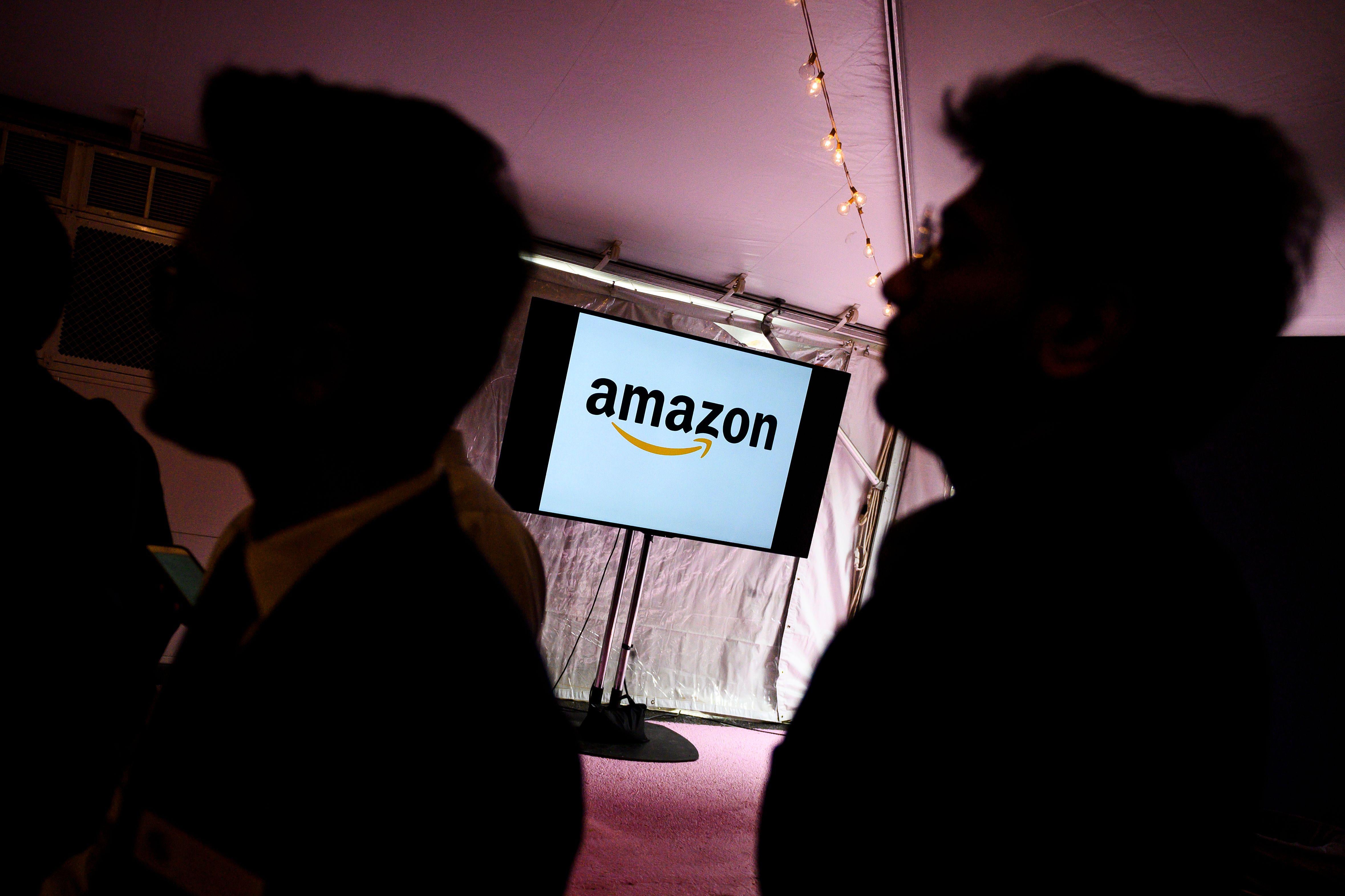 Workers at an Amazon job fair in Arlington, Virginia.