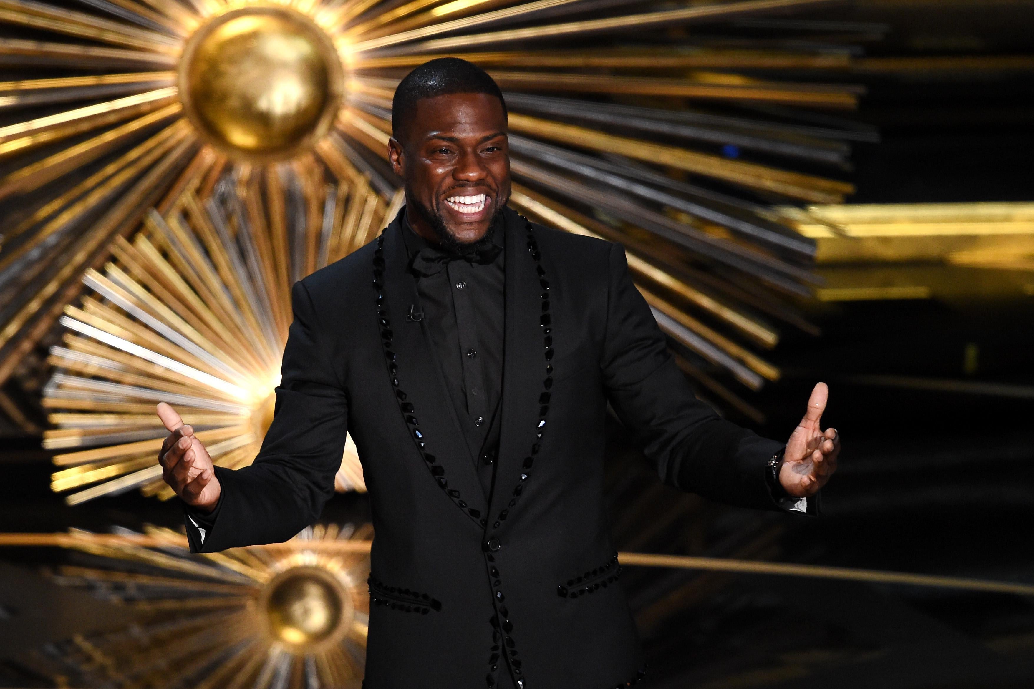 Kevin Hart onstage at the 2016 Oscars.