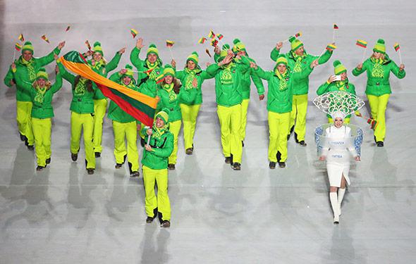 Figure skater Deividas Stagniunas of the Lithuania Olympic team carries his country's flag during the Opening Ceremony of the Sochi 2014 Winter Olympics at Fisht Olympic Stadium on February 7, 2014 in Sochi, Russia.