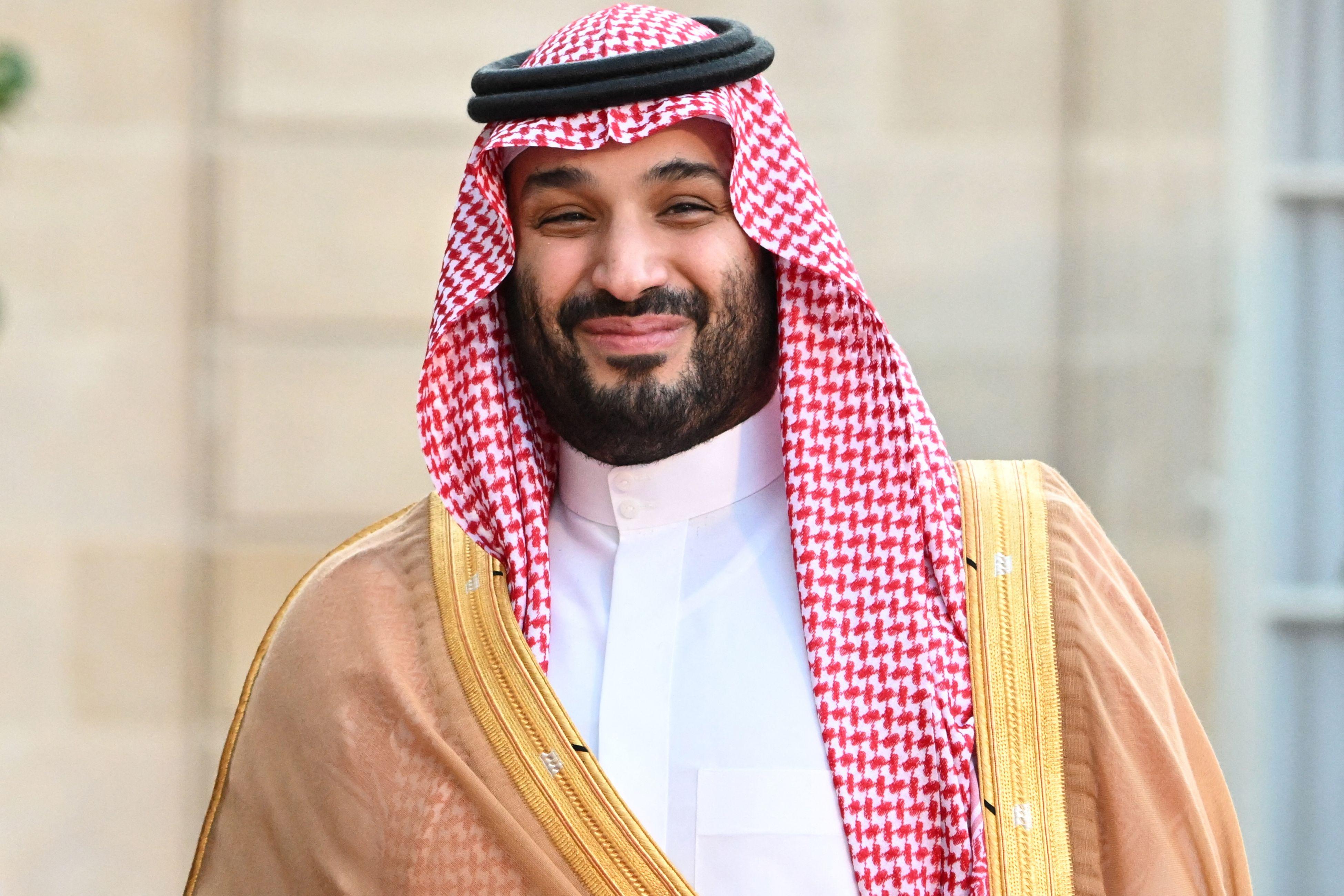 Saudi Crown Prince Mohammed bin Salman smiles as he arrives at the Elysee Palace in Paris in July.
