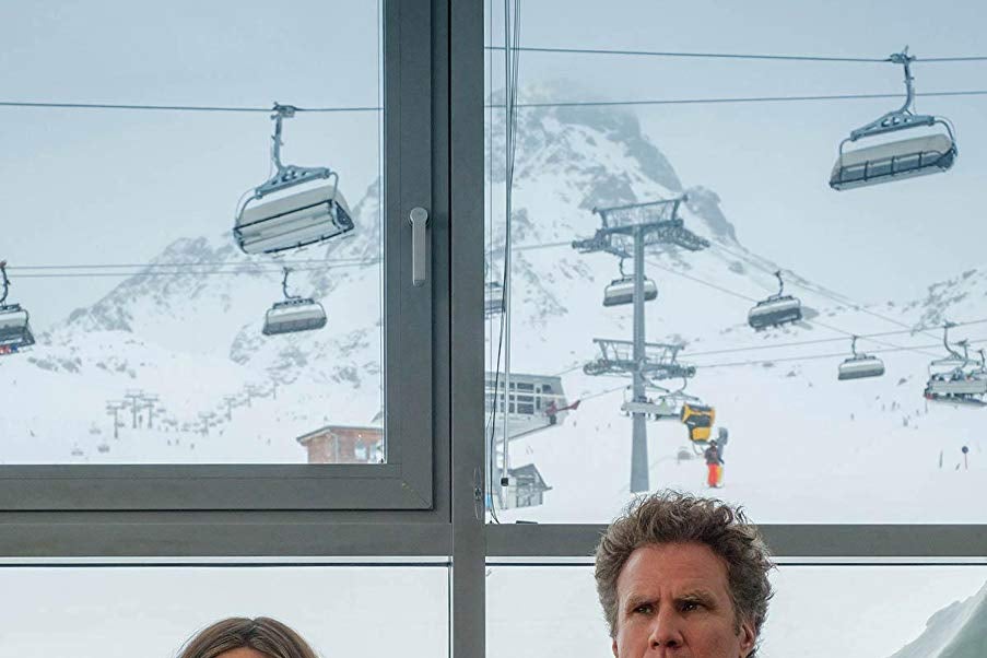 Julia Louis-Dreyfus and Will Ferrell, miserable, in parkas.