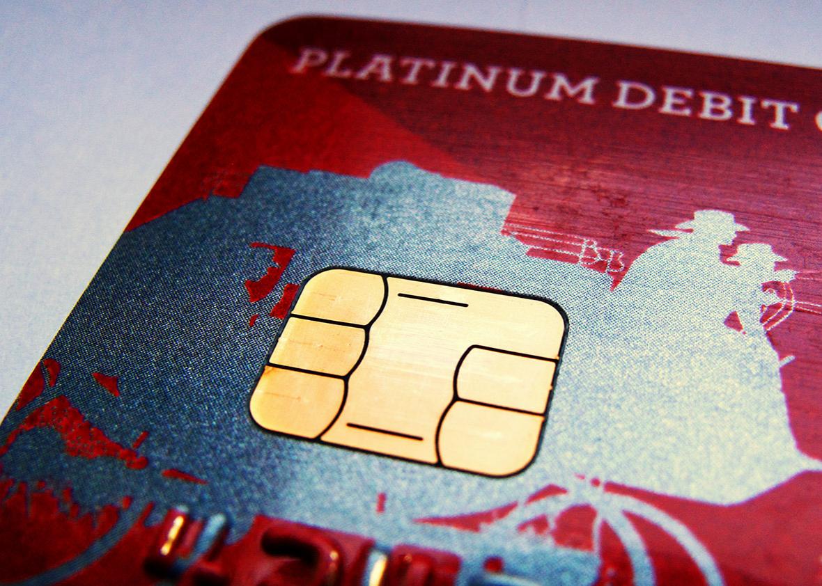 A computer chip is seen on newly issued debit/credit card in this photo illustration taken in Encinitas, California September 28, 2015. 