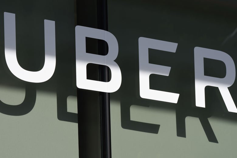 The Uber logo is seen at the second annual Uber Elevate Summit, on May 8, 2018 at the Skirball Center in Los Angeles, California. - Uber introduced it's electric powered 'flying taxi' vertical take-off and landing concept aircraft at the event, which showcases prototypes for UberAir's fleet of airborne taxis. (Photo by Robyn Beck / AFP)        (Photo credit should read ROBYN BECK/AFP/Getty Images)