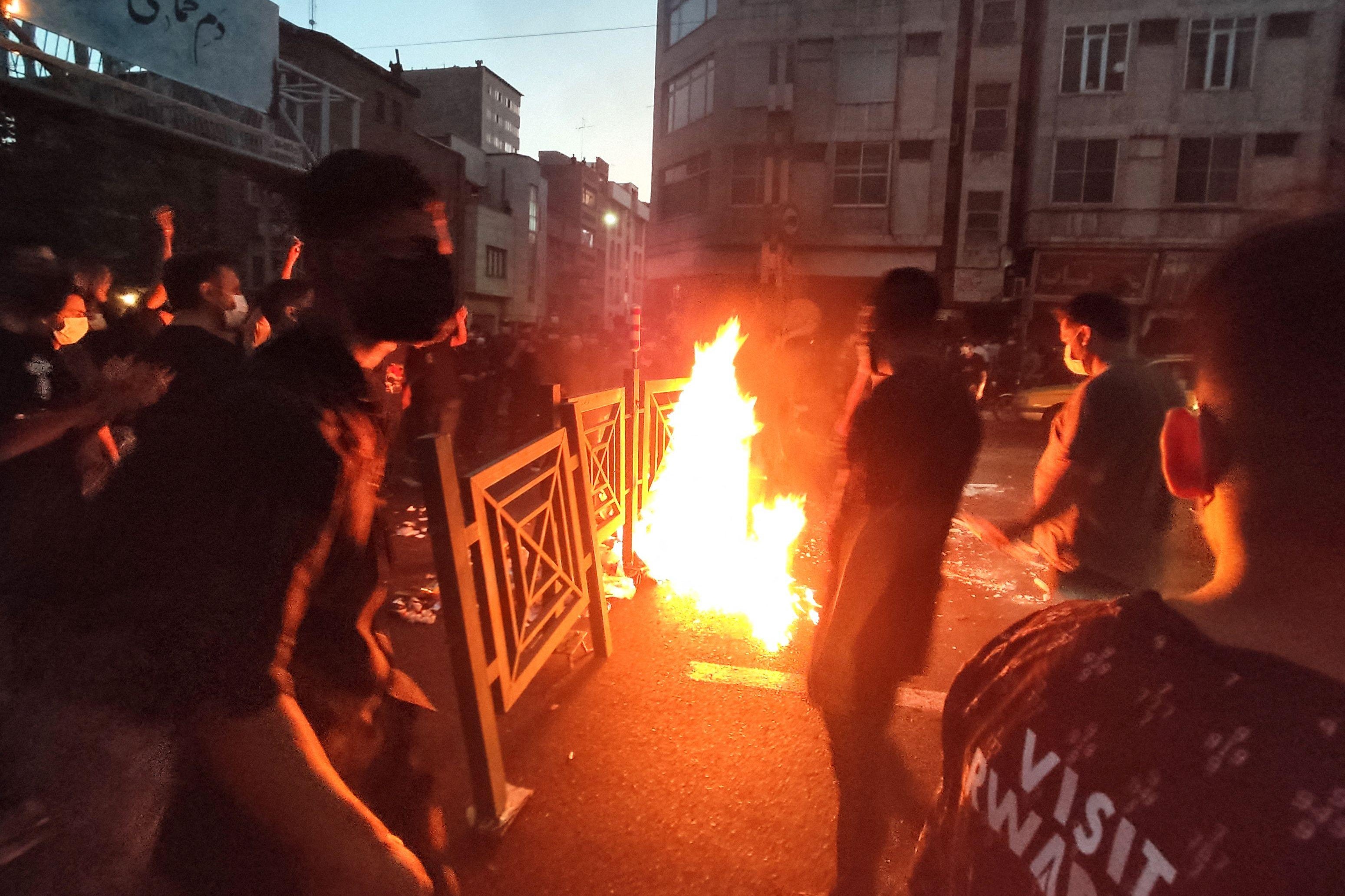 A photo obtained by the AFP inside Tehran this week shows violent protests. 