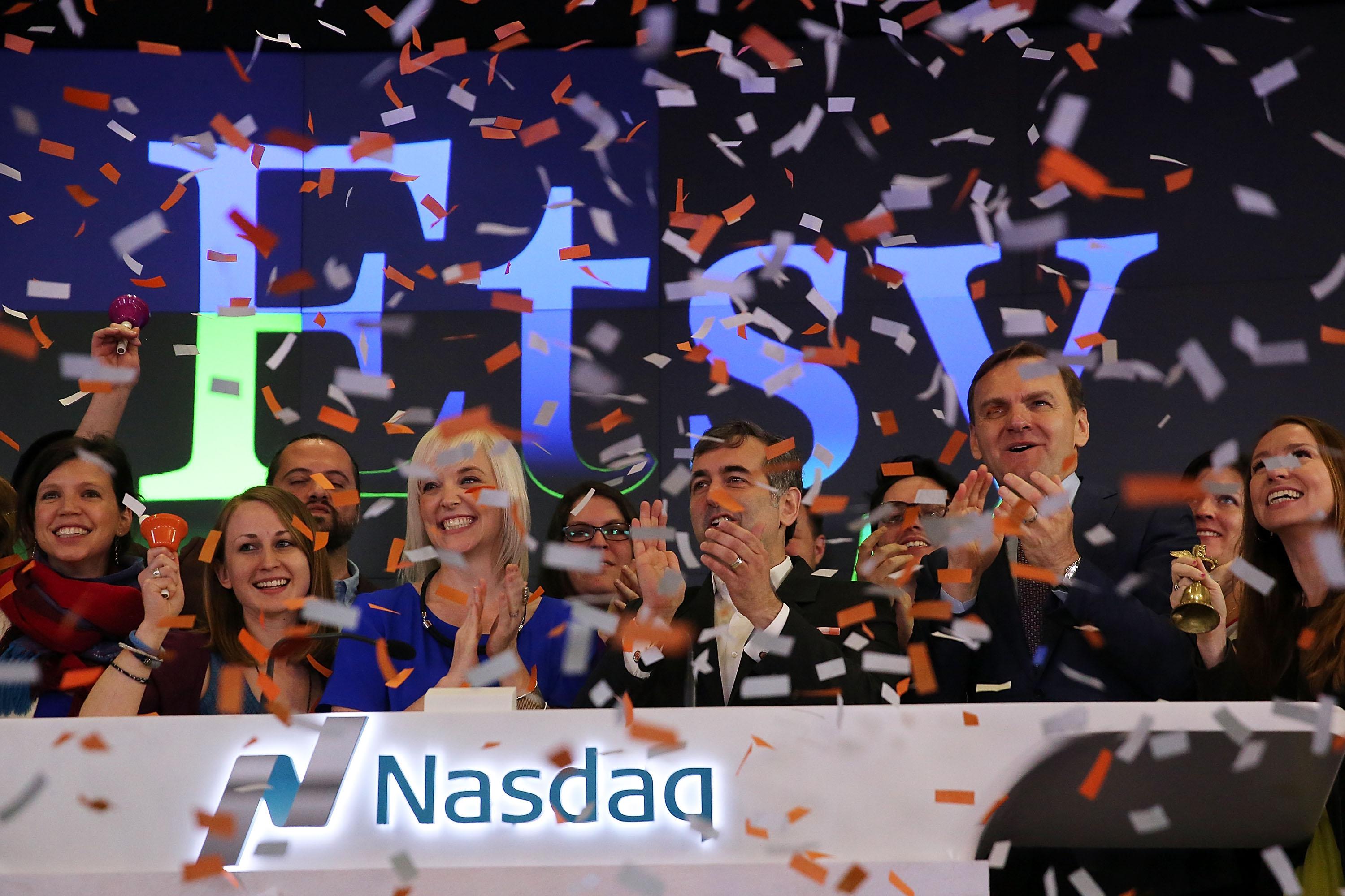 Etsy’s age-at-IPO is average for the IPO class of ’15. Above, Etsy CEO Chad Dickerson and CFO Kristina Salen celebrate their company's IPO on the floor of the Nasdaq on April 16, 2015.