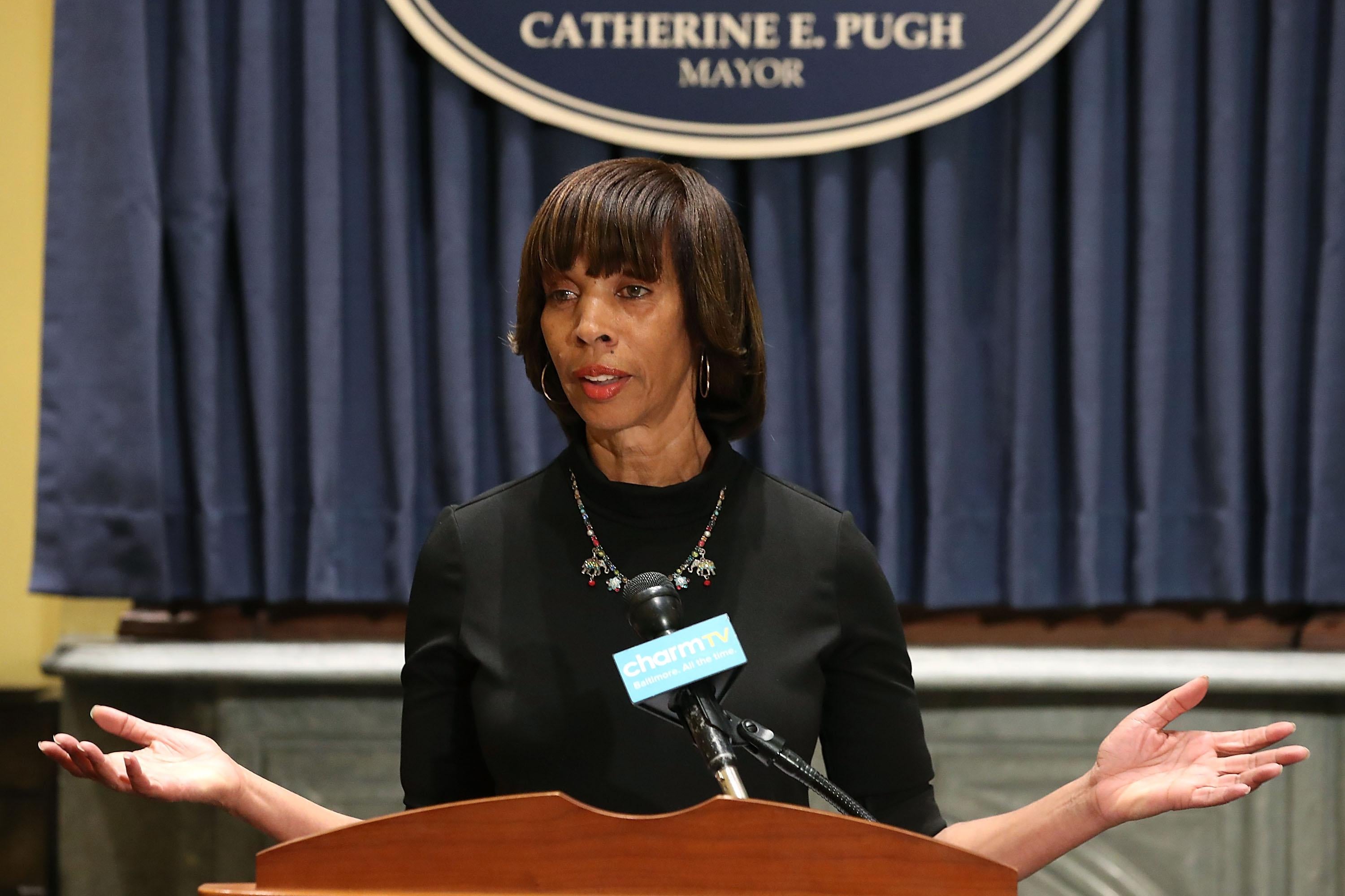 Baltimore Mayor Catherine Pugh stands at a podium in August 2017.