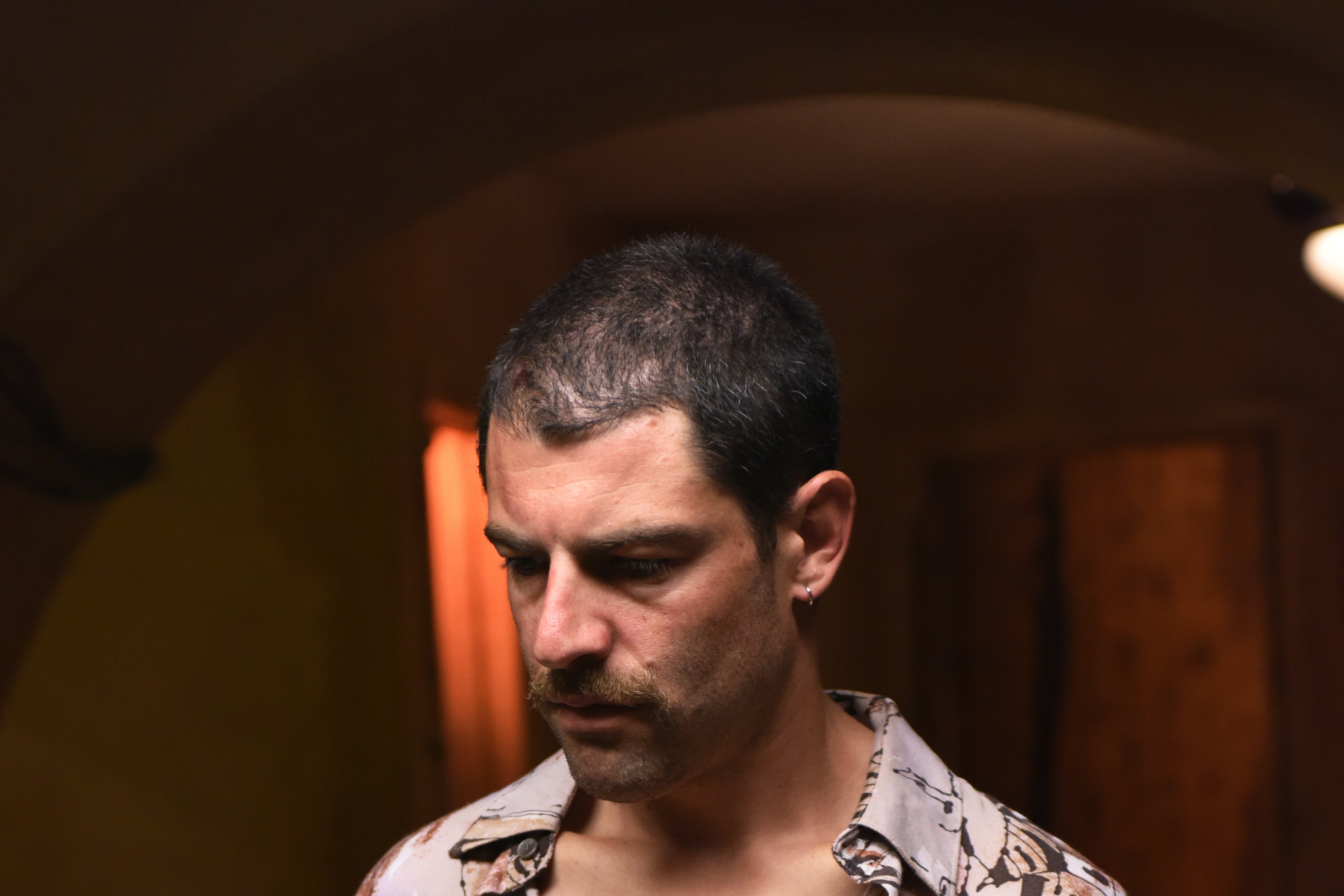 Max Greenfield as "Ronnie."