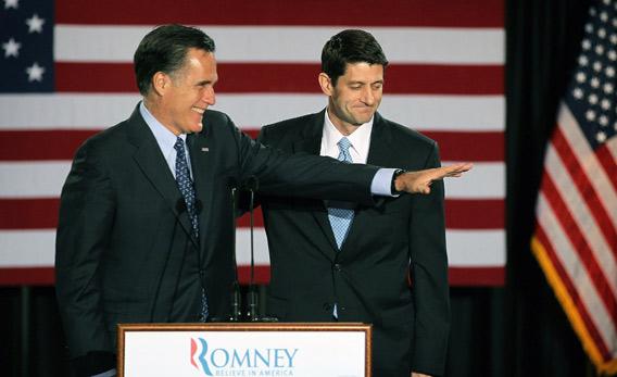 Mitt Romney, left, is introduced by Wisconsin Congressman Paul Ryan.