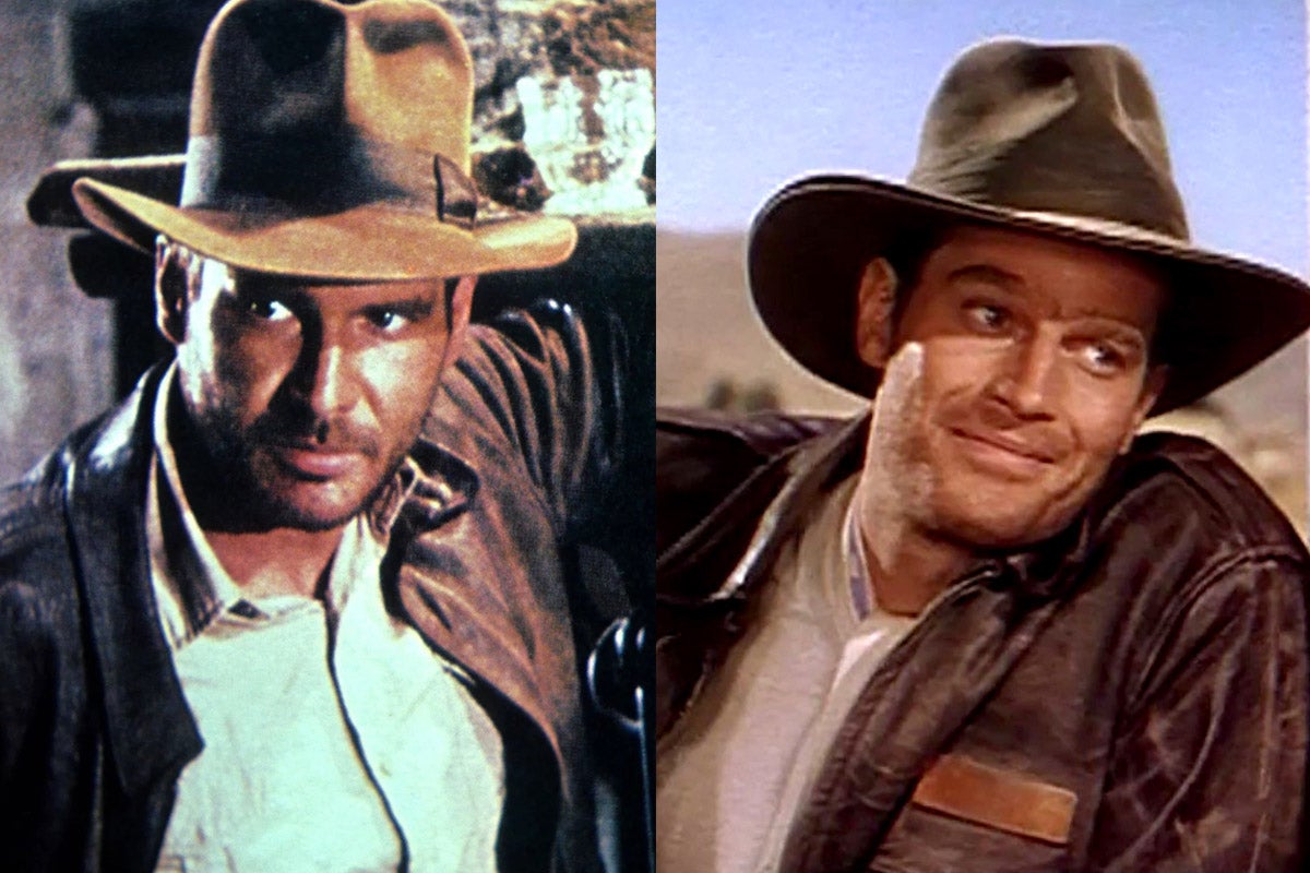 A side-by-side photo of Indiana Jones from Raiders of the Lost Ark and Charlton Heston in Secret of the Incas. Both men have light facial hair and wear a similar outfit: a fedora, black jacket, and white button-down shirt.