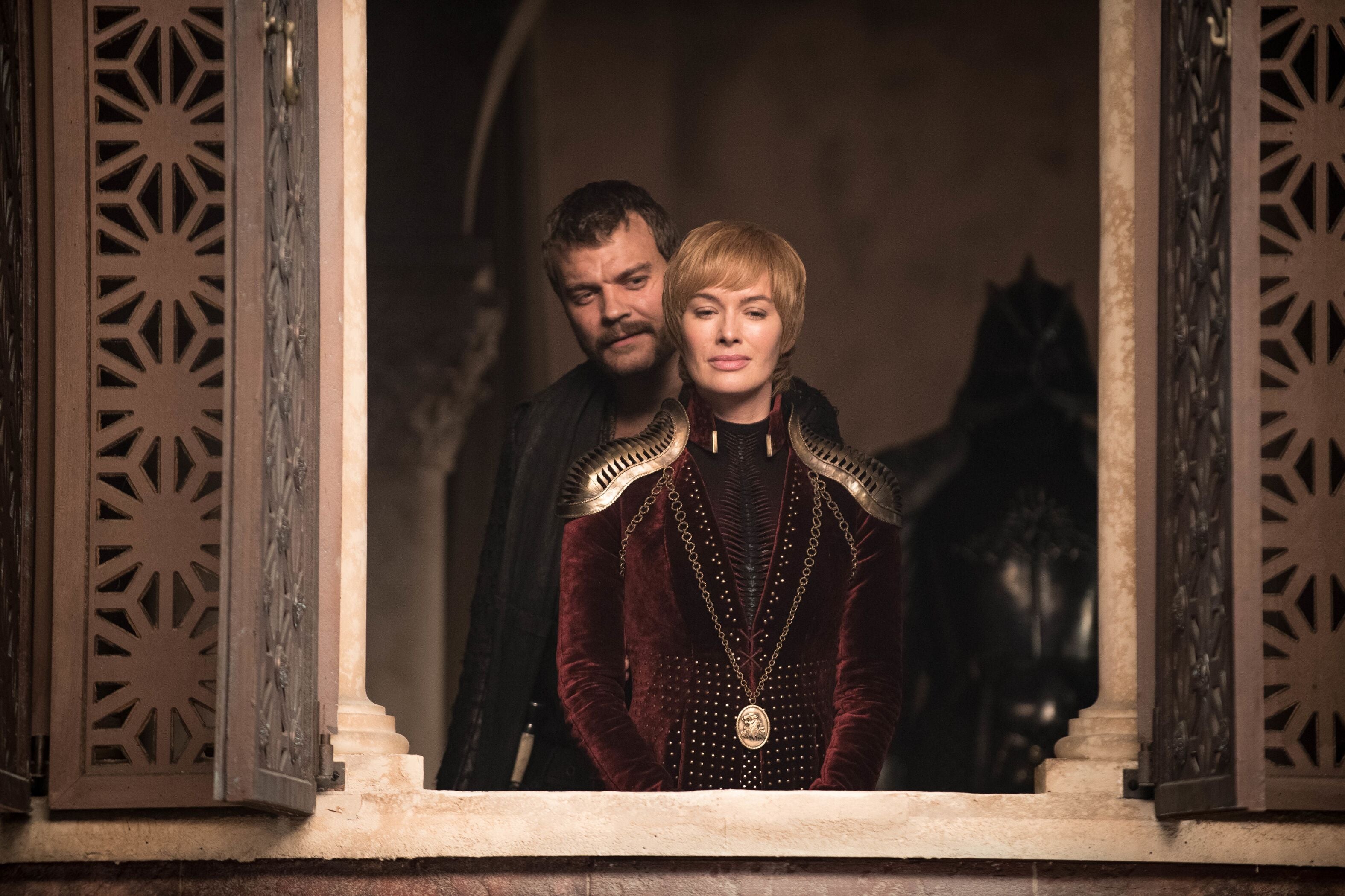 Cersei Lannister stands at a window, flanked by Euron Greyjoy and the Mountain.