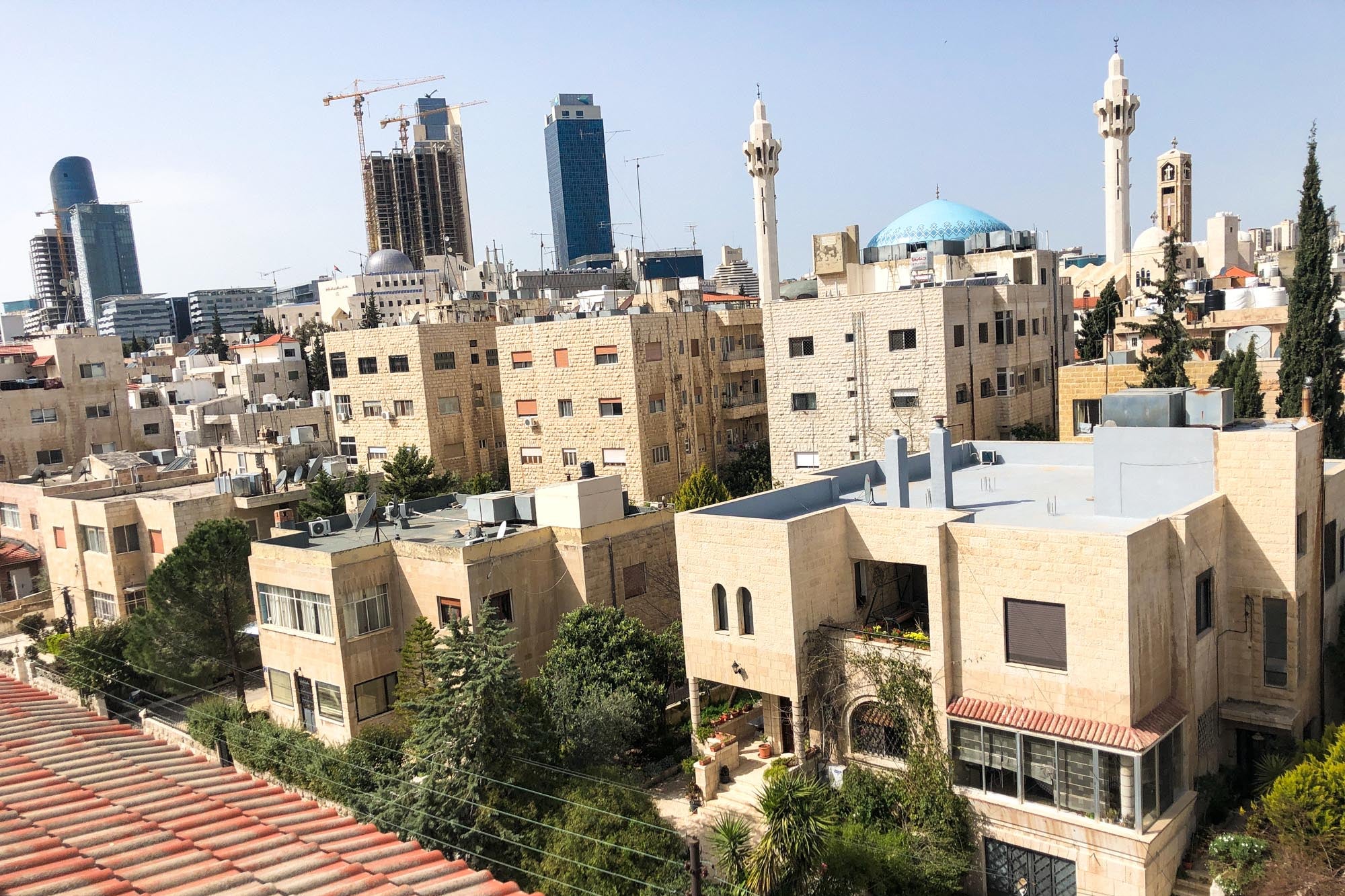 A skyline of tan buildings.