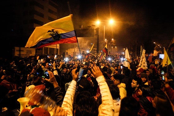 Demonstrators cheer in Quito, Ecuador.