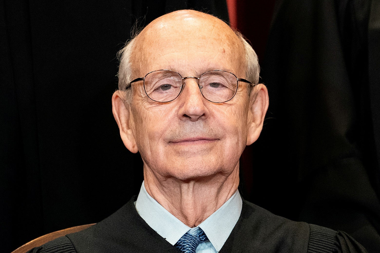 Breyer in his robes smiling for a photo