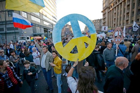 Russian peace march: Scenes from the protest and counterprotest in Moscow.