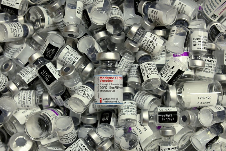 A pile of empty vaccine vials