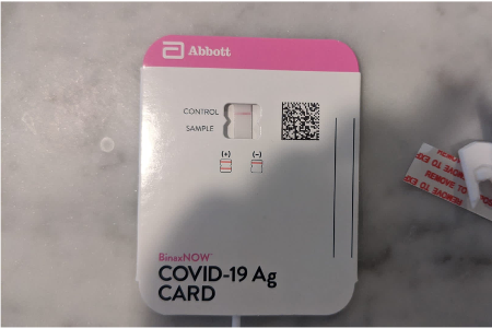 A COVID rapid test showing a negative result.
