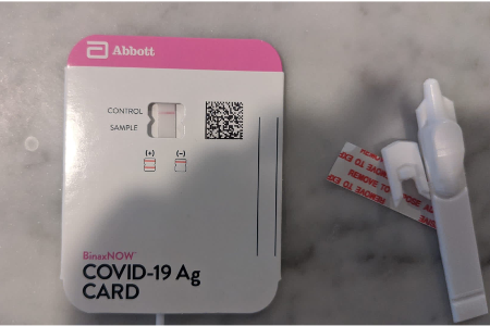 A COVID rapid test showing a negative result.