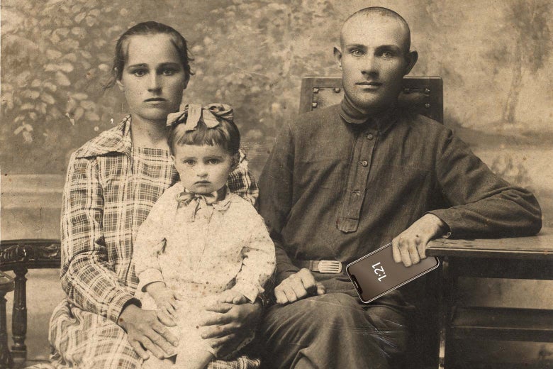 A 19th-century family. Mom is holding a child. Dad is holding an iPhone.