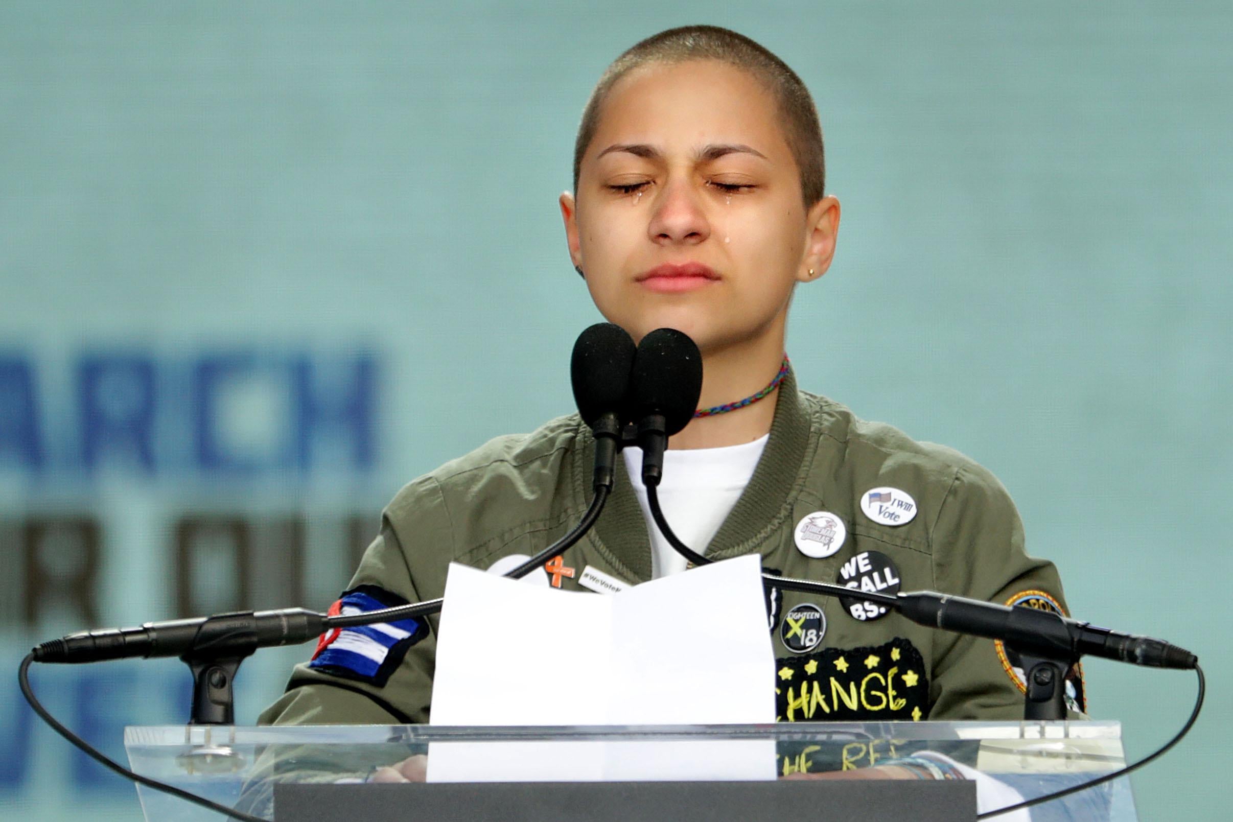 WASHINGTON, DC - MARCH 24:  Tears roll down the face of Marjory Stoneman Douglas High School student Emma Gonzalez as she observes 6 minutes and 20 seconds of silence while addressing the March for Our Lives rally on March 24, 2018 in Washington, DC. Hundreds of thousands of demonstrators, including students, teachers and parents gathered in Washington for the anti-gun violence rally organized by survivors of the Marjory Stoneman Douglas High School shooting on February 14 that left 17 dead. More than 800 related events are taking place around the world to call for legislative action to address school safety and gun violence.  (Photo by Chip Somodevilla/Getty Images)