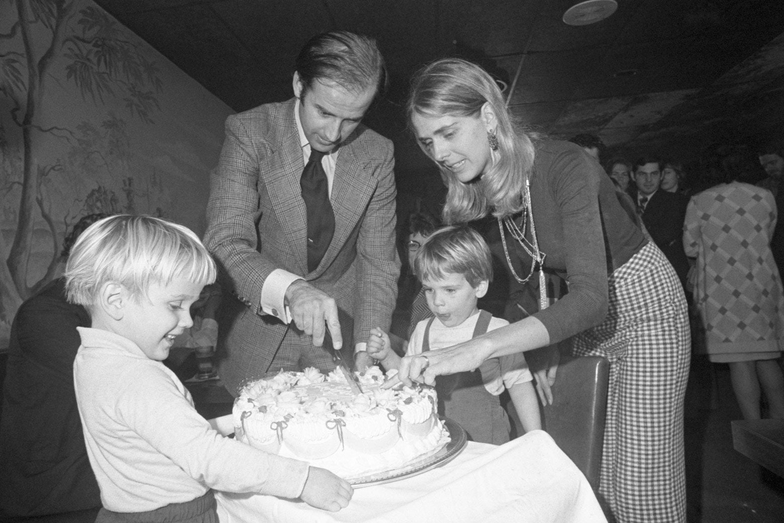 Sen.-elect Joseph Biden and wife Neilia cut his 30th birthday cake at a party in Wilmington, Delaware, on Nov. 20, 1972. His son Hunter waits for the first piece.