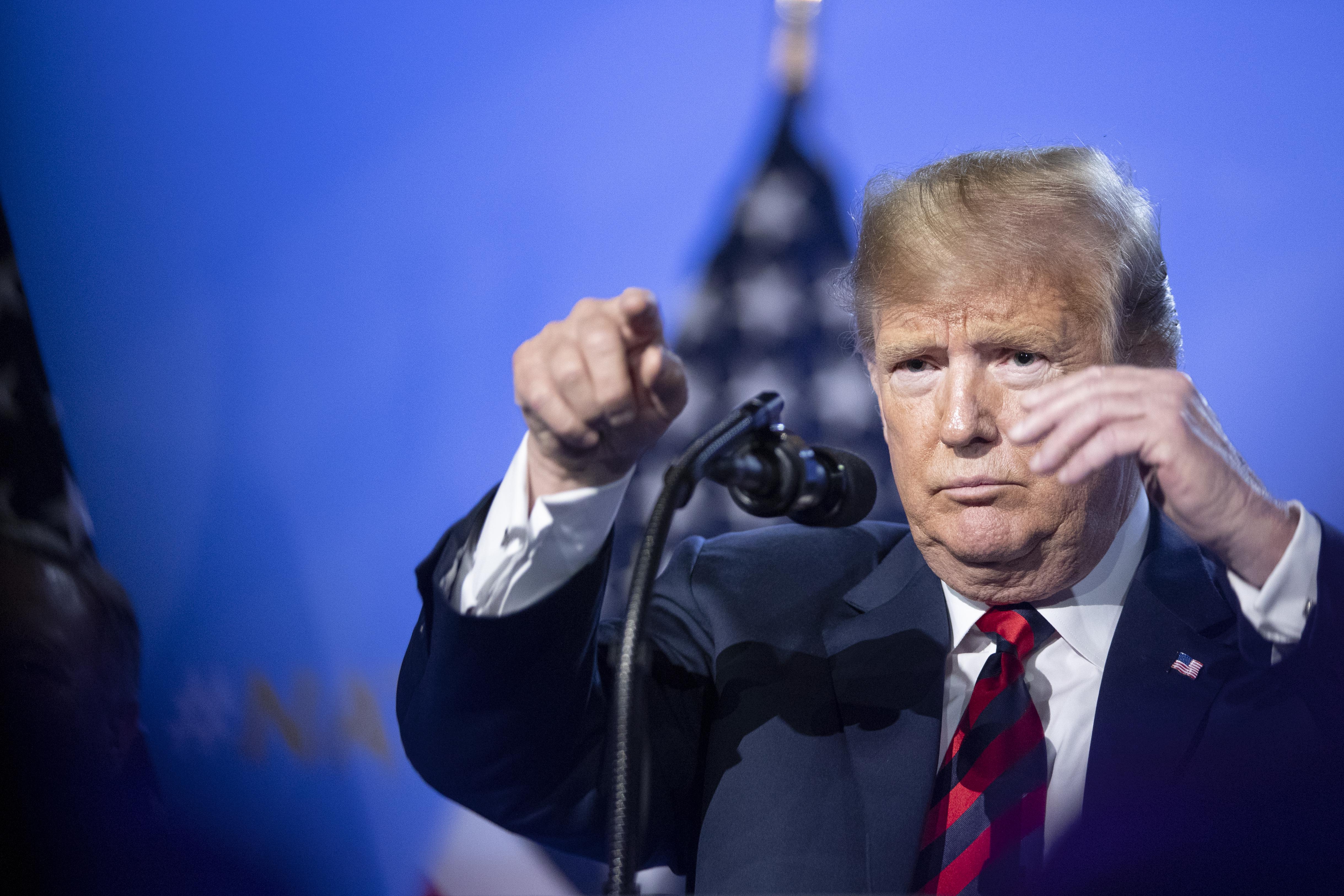 U.S. President Donald Trump gestures during a news conference at the 2018 NATO Summit at NATO headquarters on July 12, 2018, in Brussels, Belgium. 