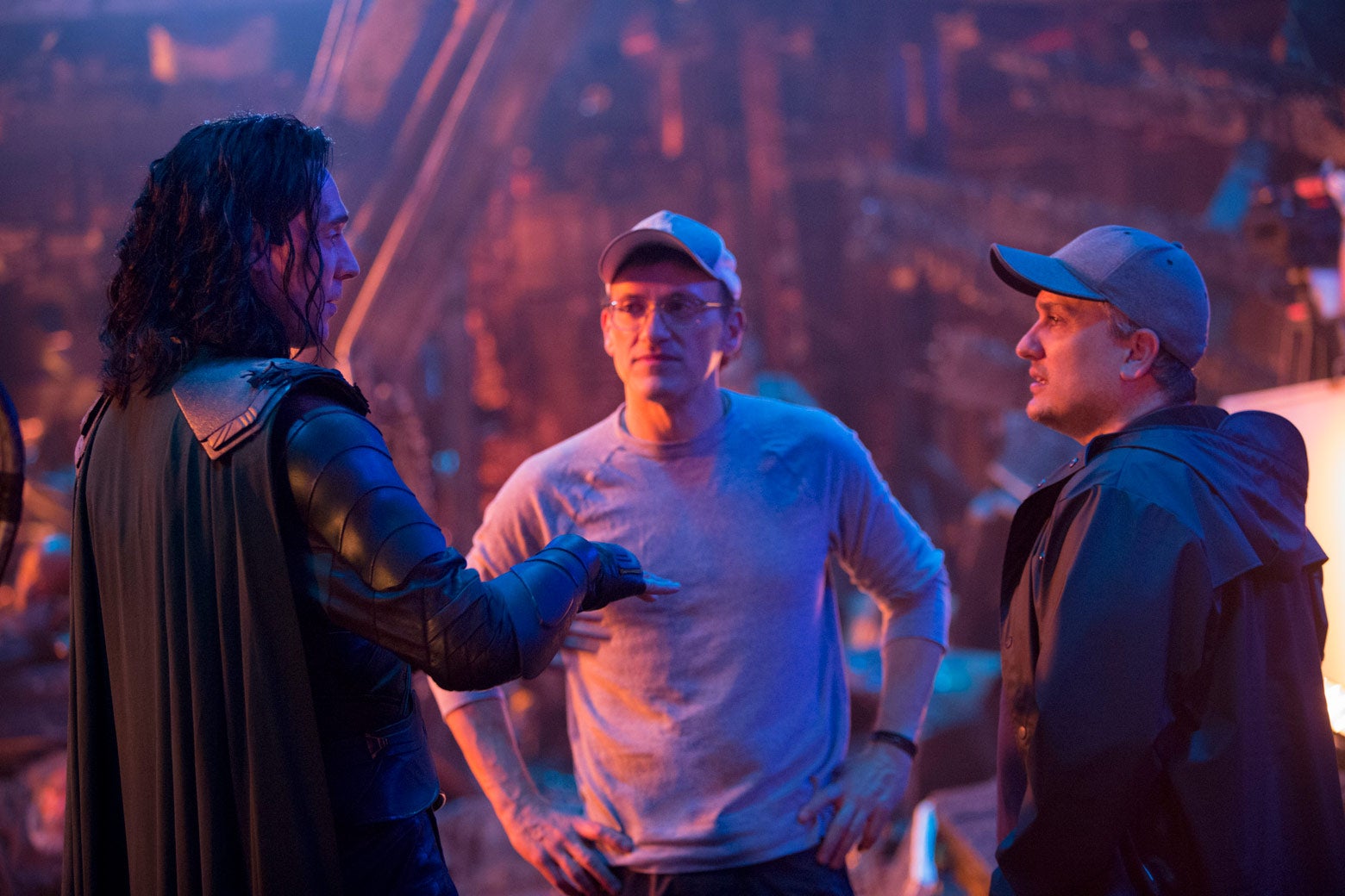 Joe and Anthony Russo directing Hiddleston as Loki on set.