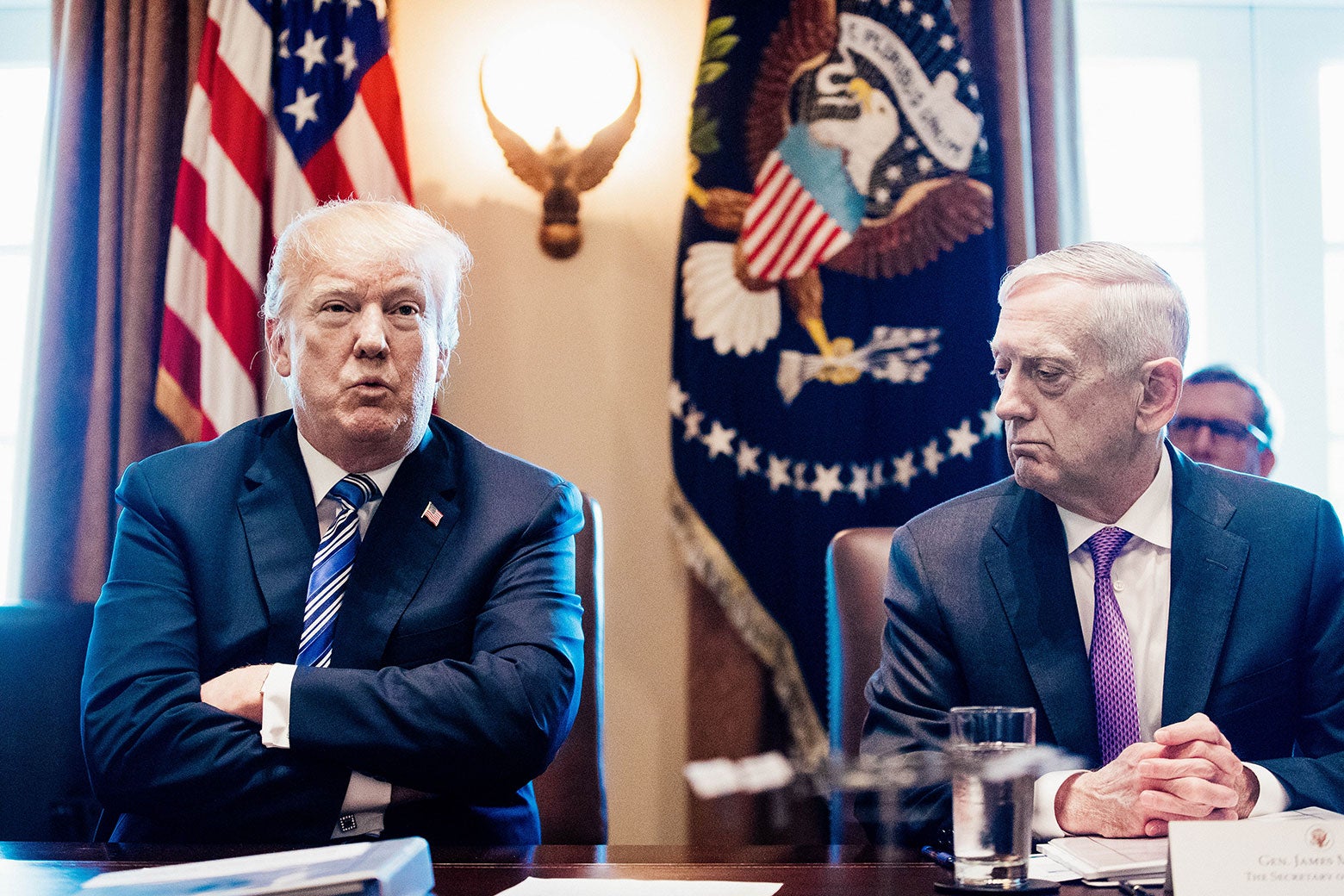 President Donald J. Trump speaks beside  Secretary of Defense Jim Mattis during a meeting with Cabinet members on March 8 in Washington.