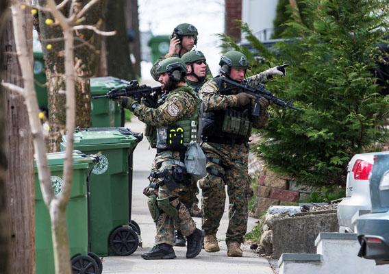 SWAT teams searched homes along Winsor Avenue in Watertown on April 19, 2013 while searching for one of the two suspects in the terrorist bombing of the 117th Boston Marathon earlier this week.