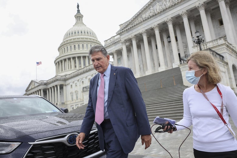 WASHINGTON, DC - SEPTEMBER 22: Sen. Joe Manchin (D-WV) leaves the U.S. Capitol to meet with President Biden on September 22, 2021 in Washington, DC. The Senate Republicans said they will not vote to pass the continuing resolution that was recently voted on by the House of Representatives, which would fund the government for the new fiscal year and includes an increase to the debt ceiling.  (Photo by Kevin Dietsch/Getty Images)