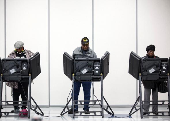 Voters cast their ballots in the midterm elections in Ferguson, Missouri, on Nov. 4, 2014